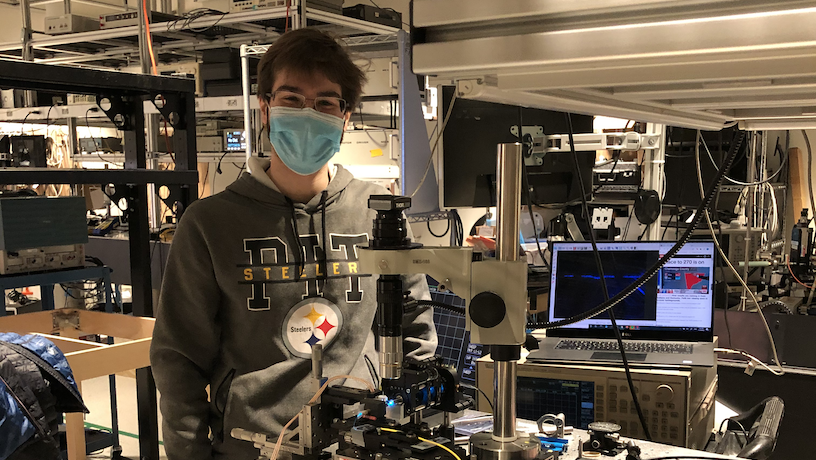 Young man with scientific equipment.