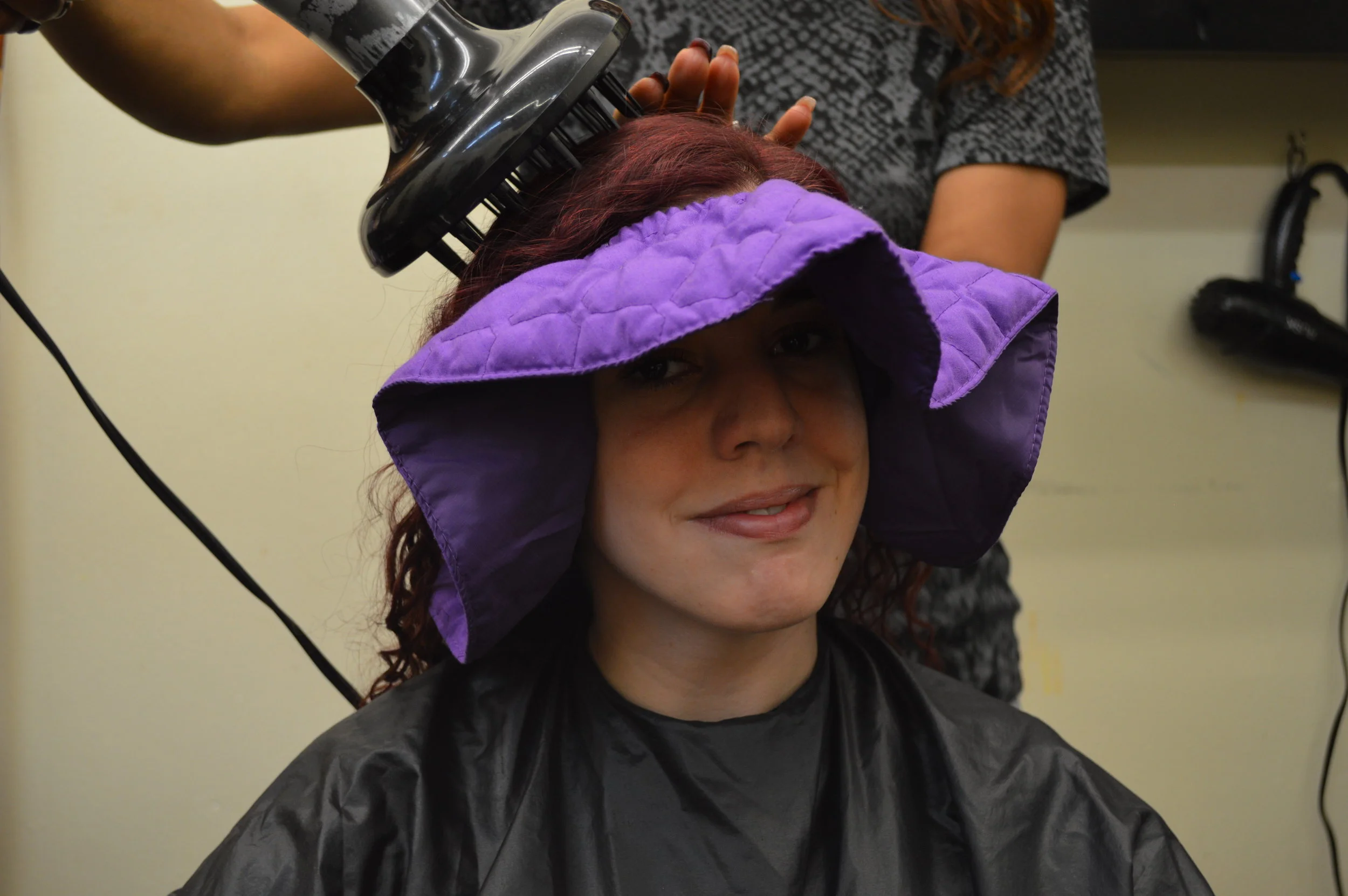 SHIELD THE FACE FROM THE BLOW DRYER HEAT.