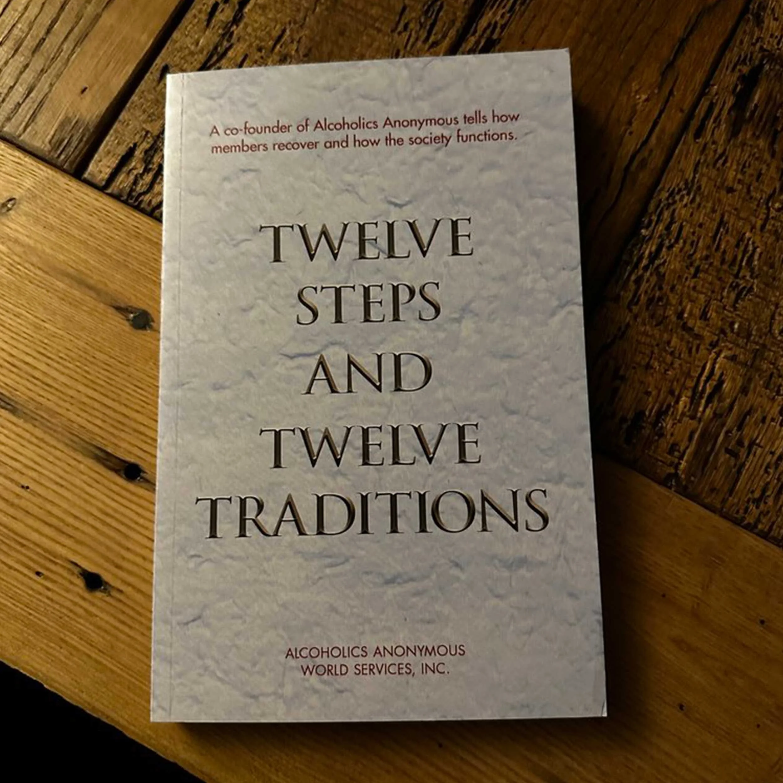 What does AA's Tradition 12 mean?