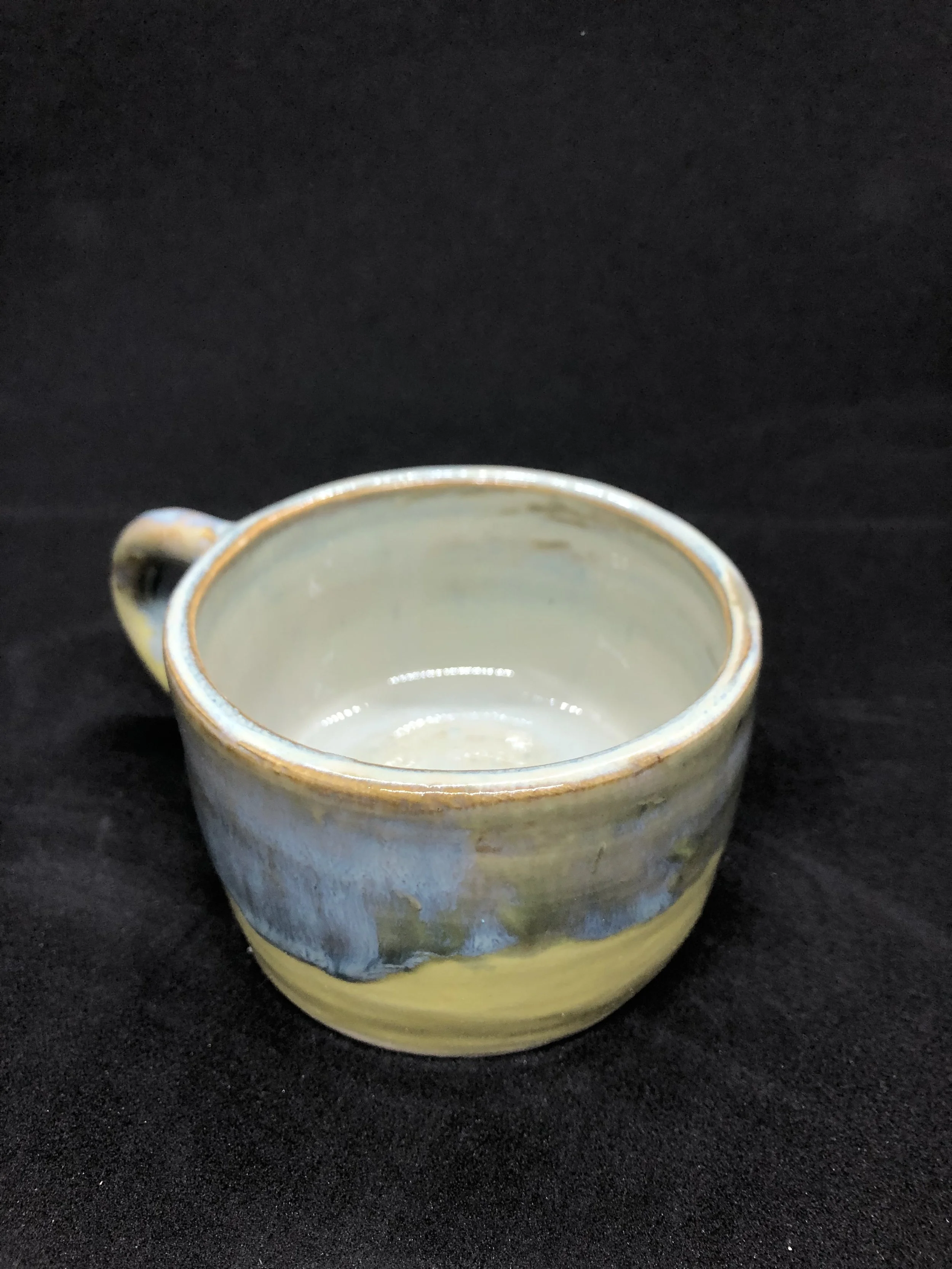 Thrown cup with yellow glaze