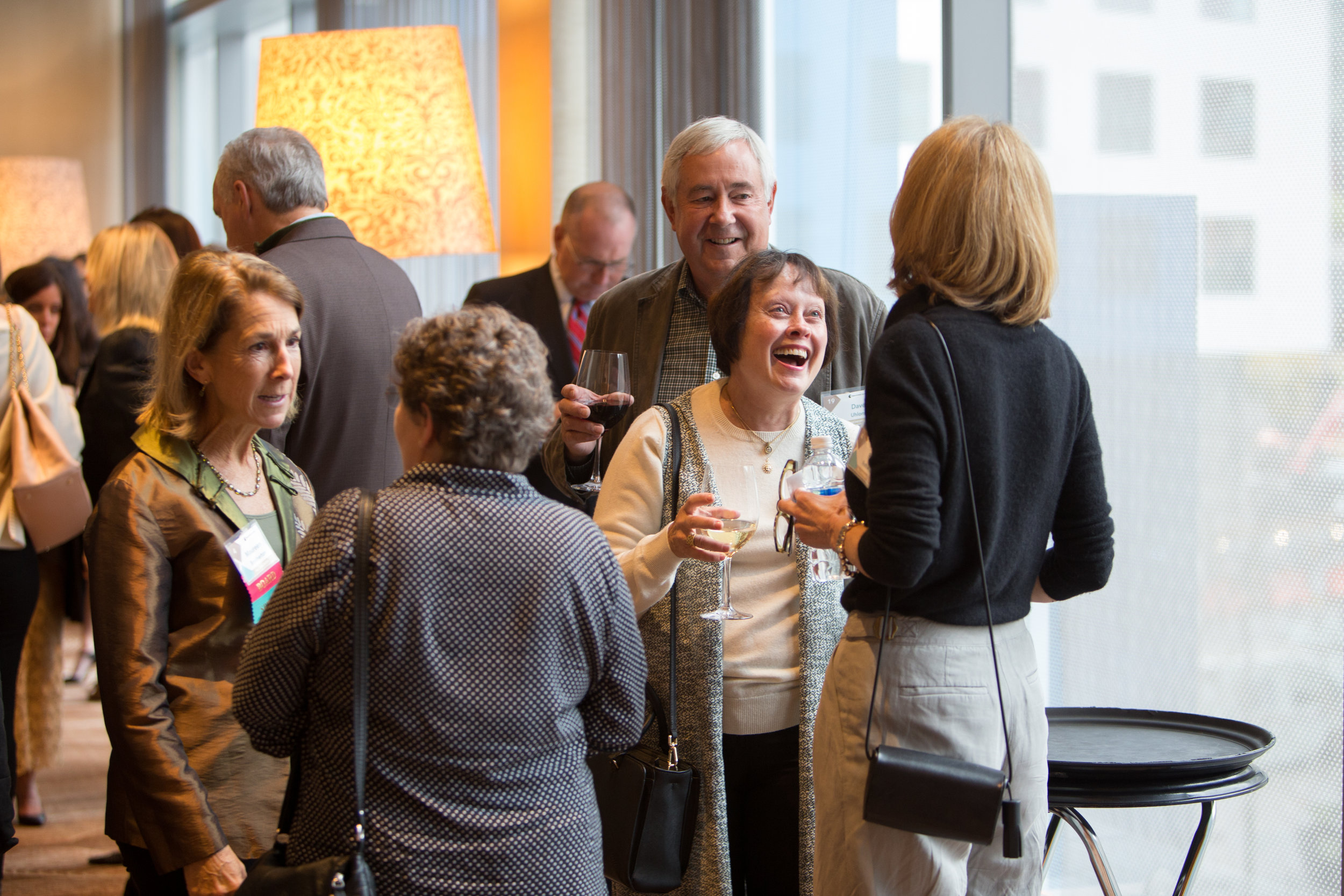 TIPS Co-Founder Maureen Brotherton (far left) enjoys a moment with guests