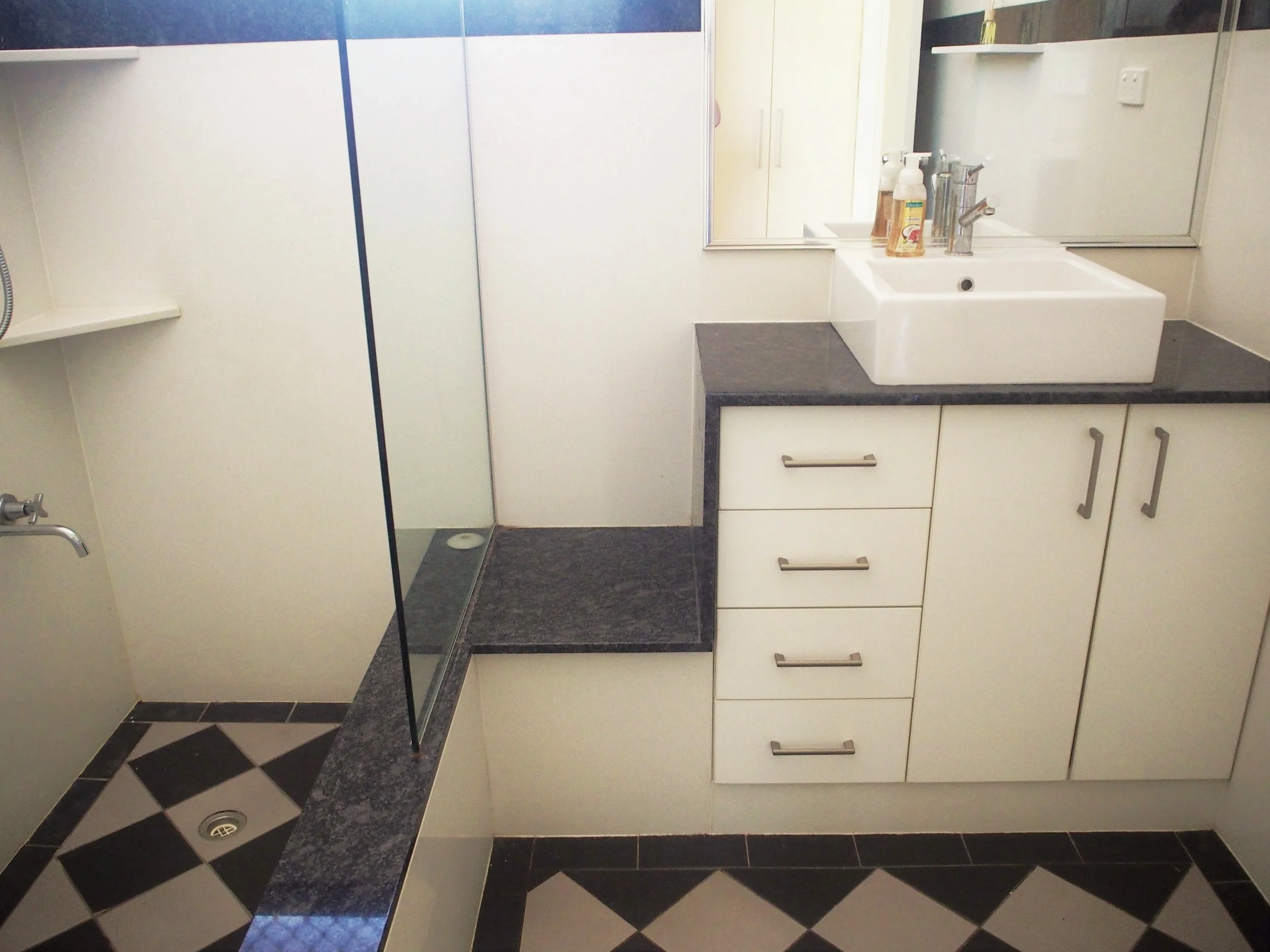 Vanity & roman bath with waterfall edge, Woodroffe
