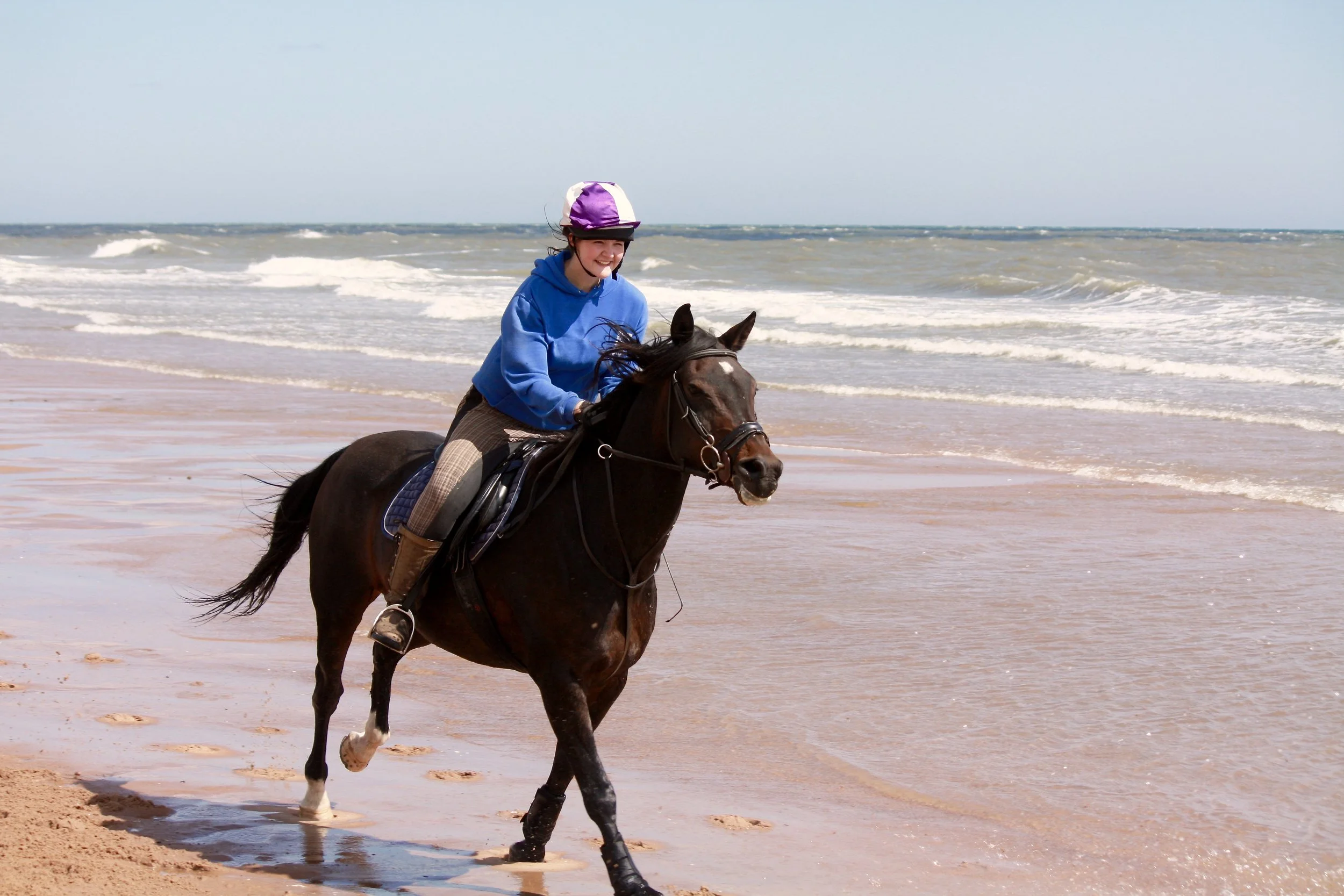 Chiara with horse Danny at the Balmedie Beach in Aberdeen.