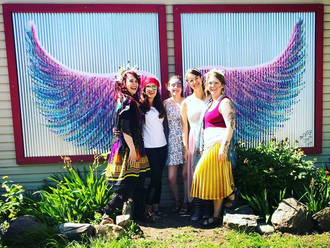 Please check out the huge fairy wing mural that on the side of Roaming Goat coffee shop! #grasslakefairydoors #thepaintedowl #drinkroaminggoat