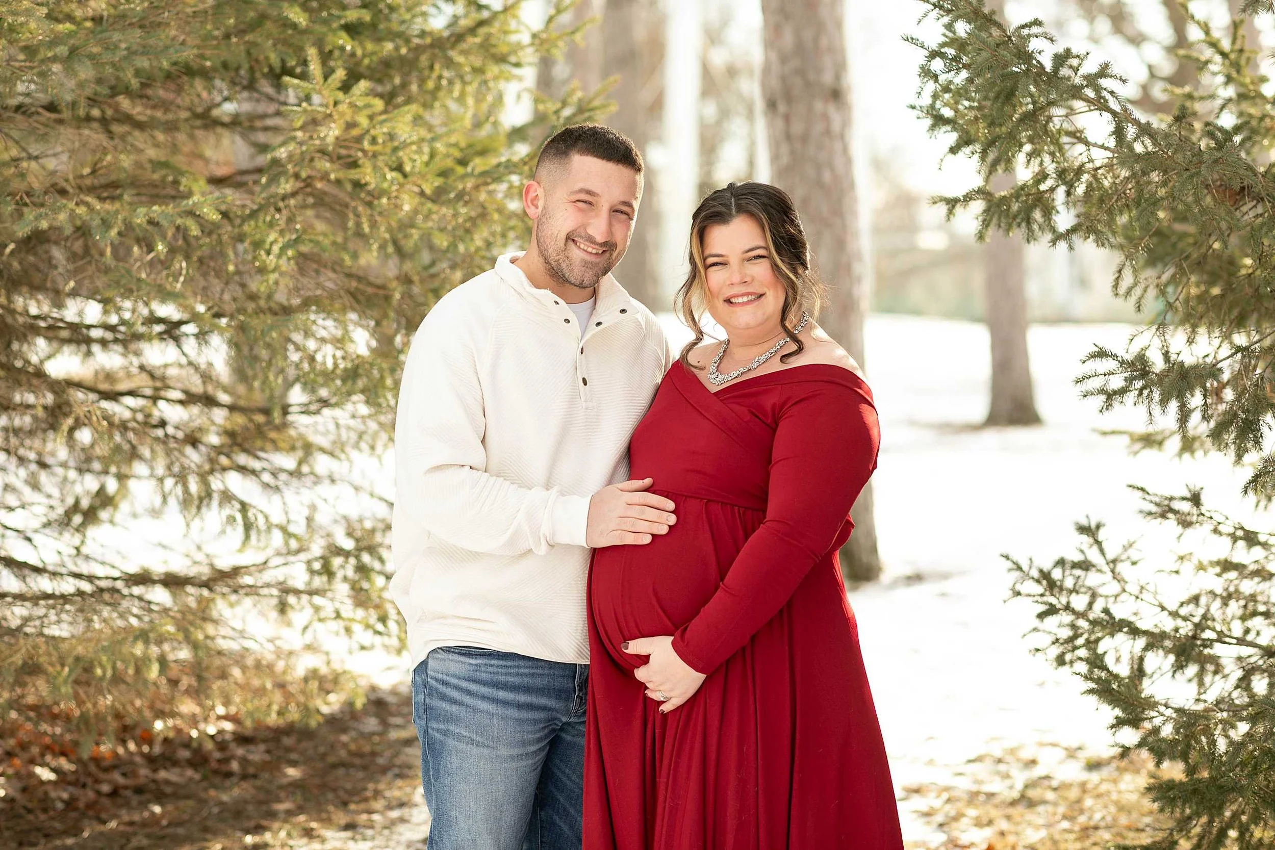 Snowy winter maternity session at evergreen park in Lowell Indiana