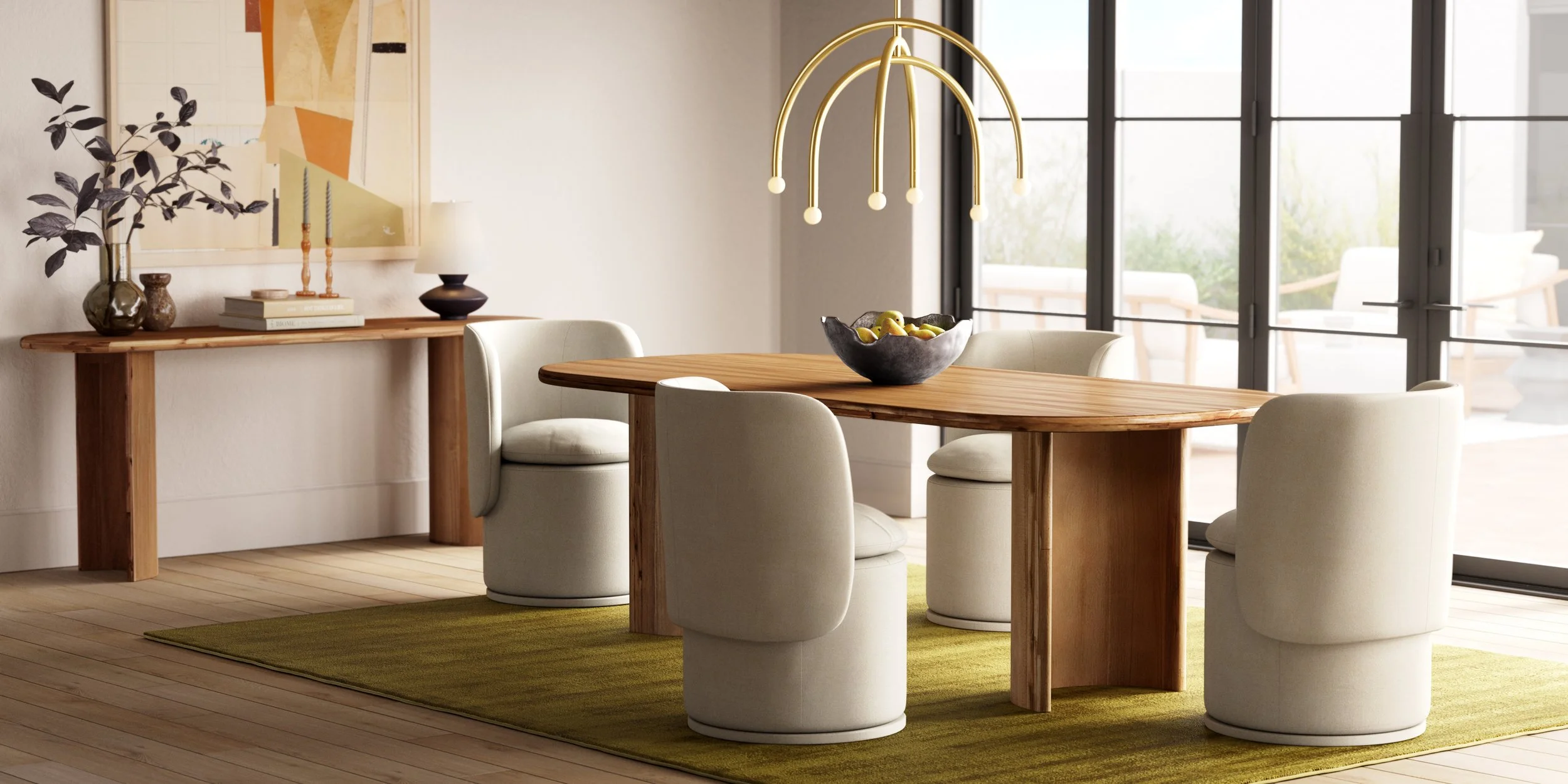 Modern dining room with a wooden table and four white upholstered chairs, a green area rug, a wooden console with vases and books, and a window with sliding glass doors letting in natural light.