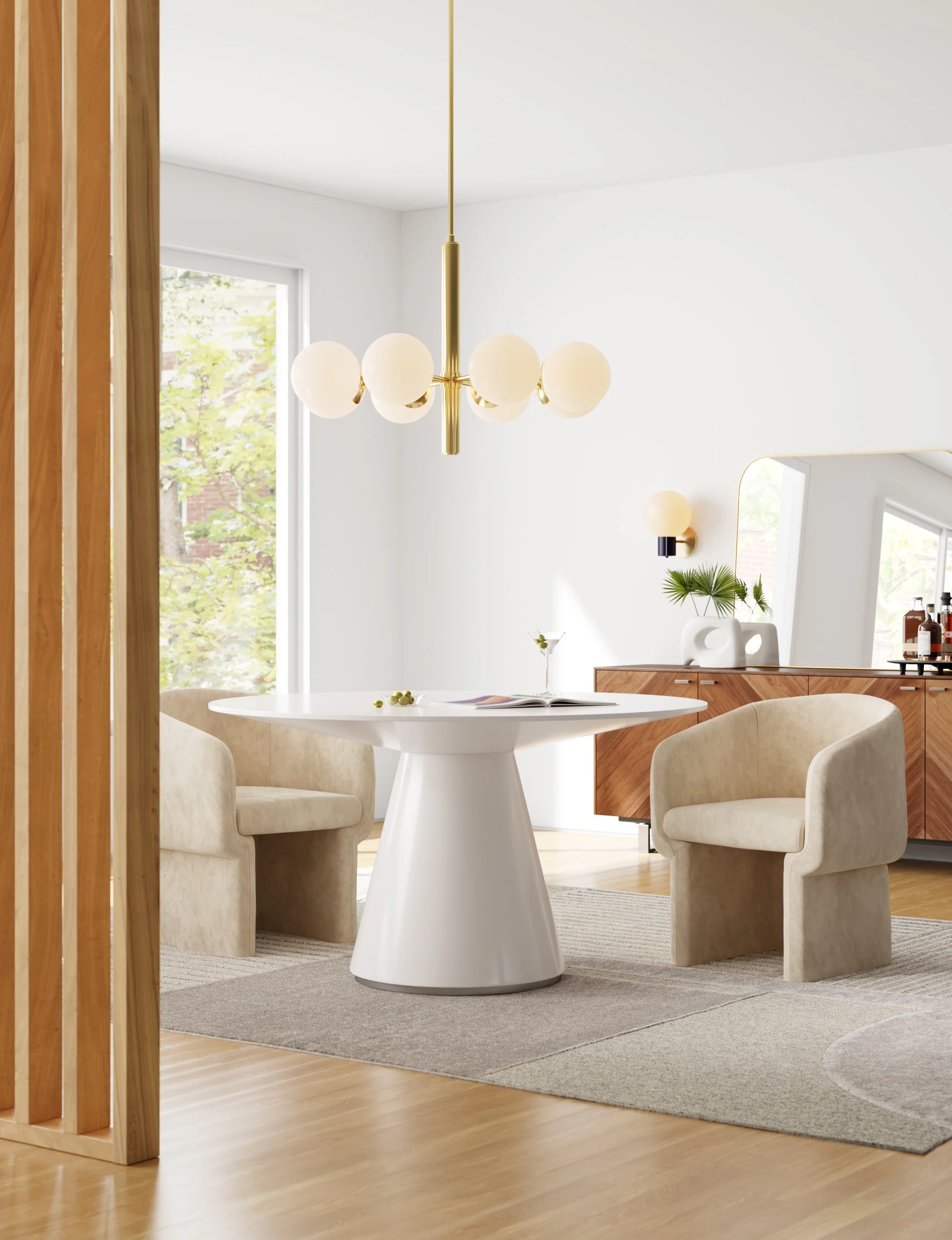 Modern dining room with a white round table, two beige upholstered chairs, a wooden sideboard, a large window, and a gold chandelier with white globes.