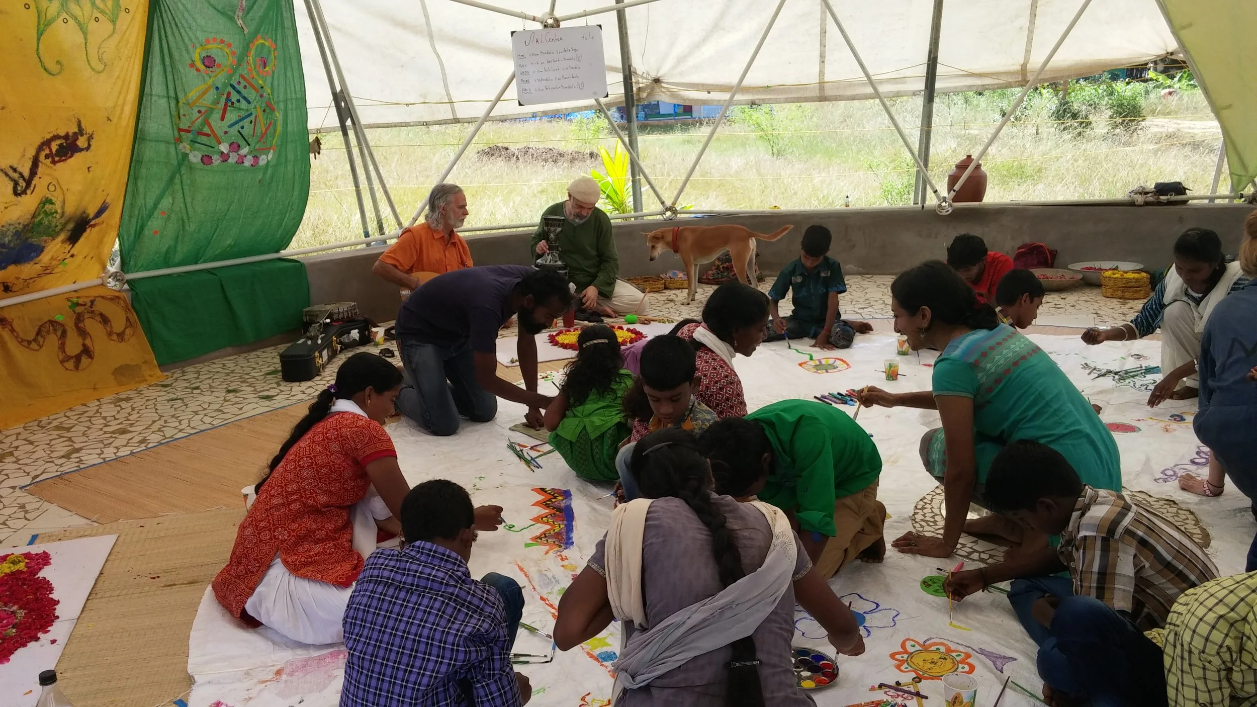 Our new found friend and colleague Tugay from Turkey playing music for children from the local villages around Auroville in an expressive arts workshop with Kripa Devi in her beautiful geodesic dome Sankalpa (which means intention or affirmation).