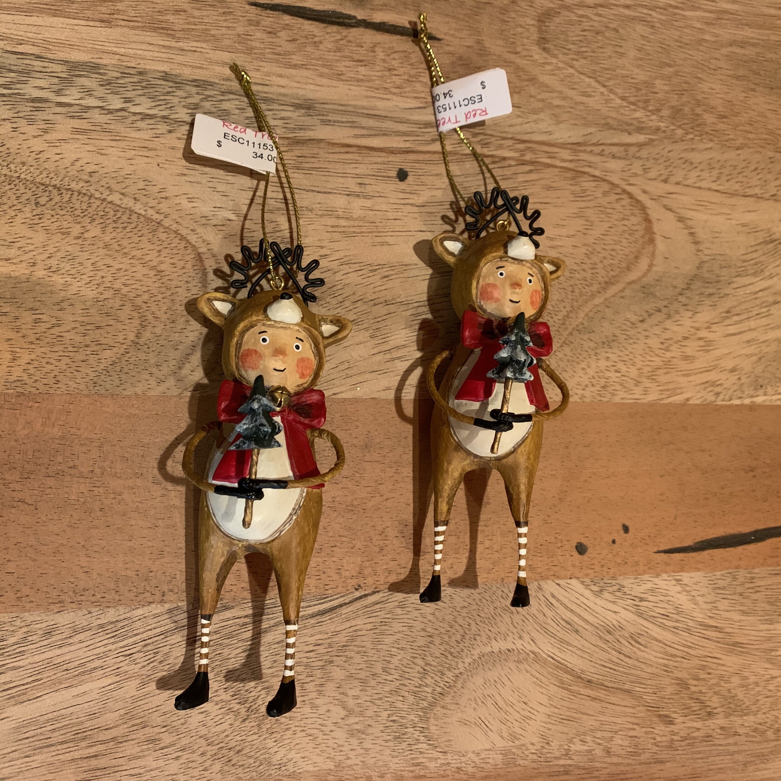 Boy in Reindeer Costume Figurine