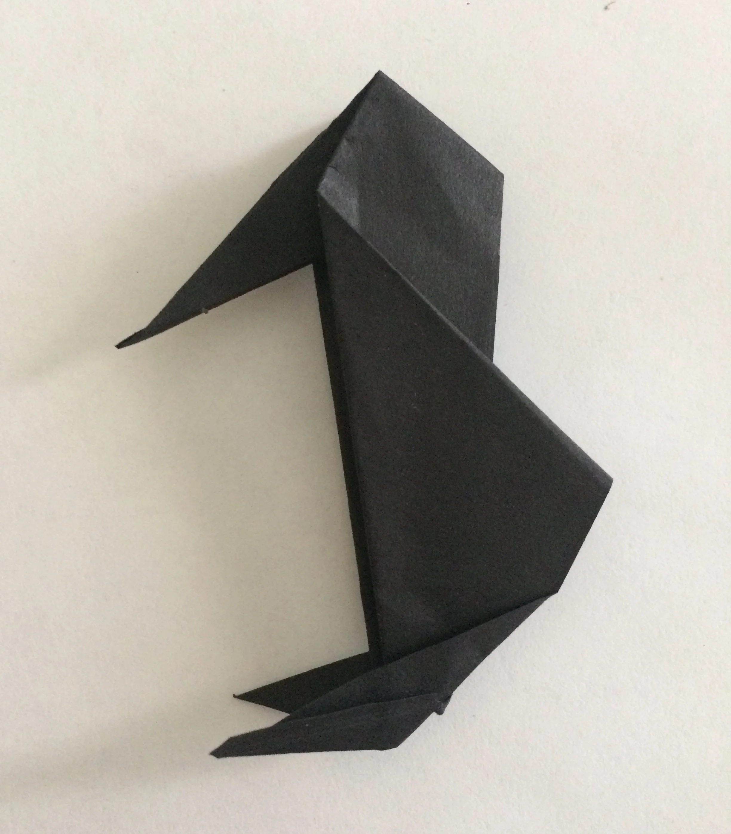 My design of an Origami Crow made very simply for the beginner levels of my students
