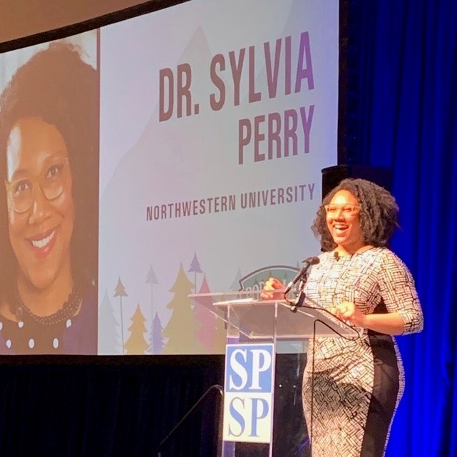 Dr. Perry giving a talk at the 2019 SPSP Presidential Plenary Session in Portland, Oregon.