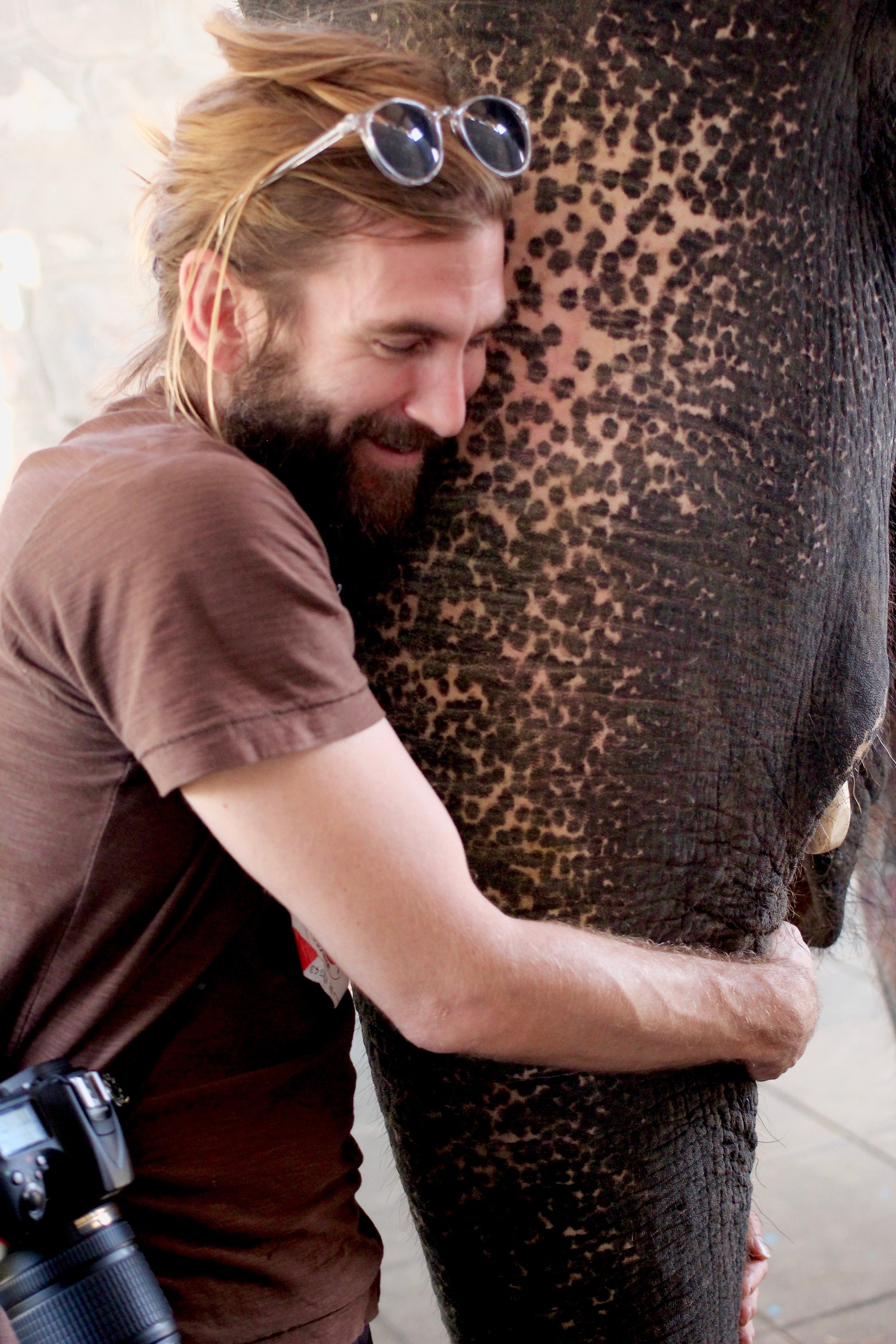 Wylie hugging his first real live elephant.