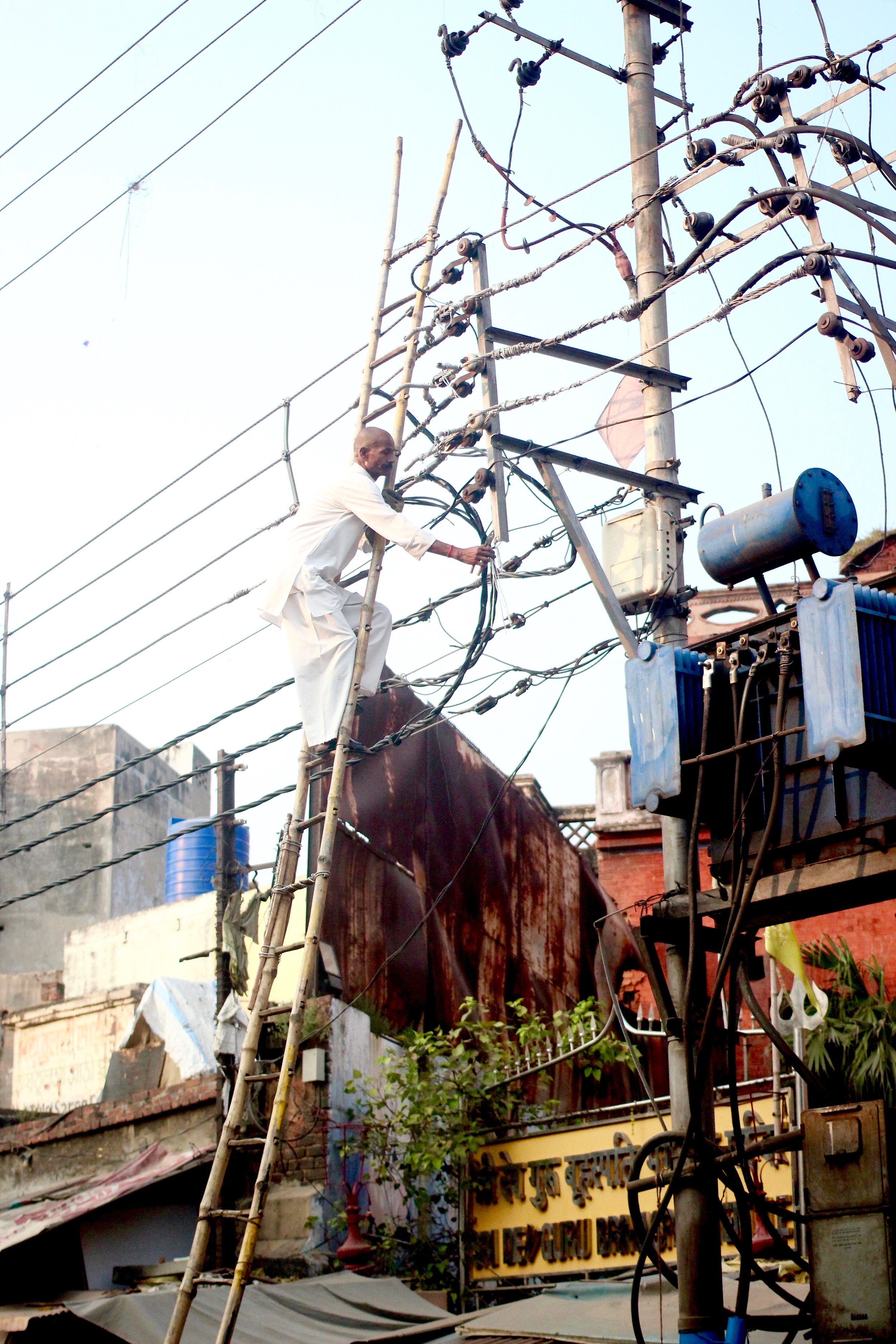 We thought we heard some pre-Diwali fireworks go off, but it was really just an electricity mishap (this guy/electrician was completely unfazed)