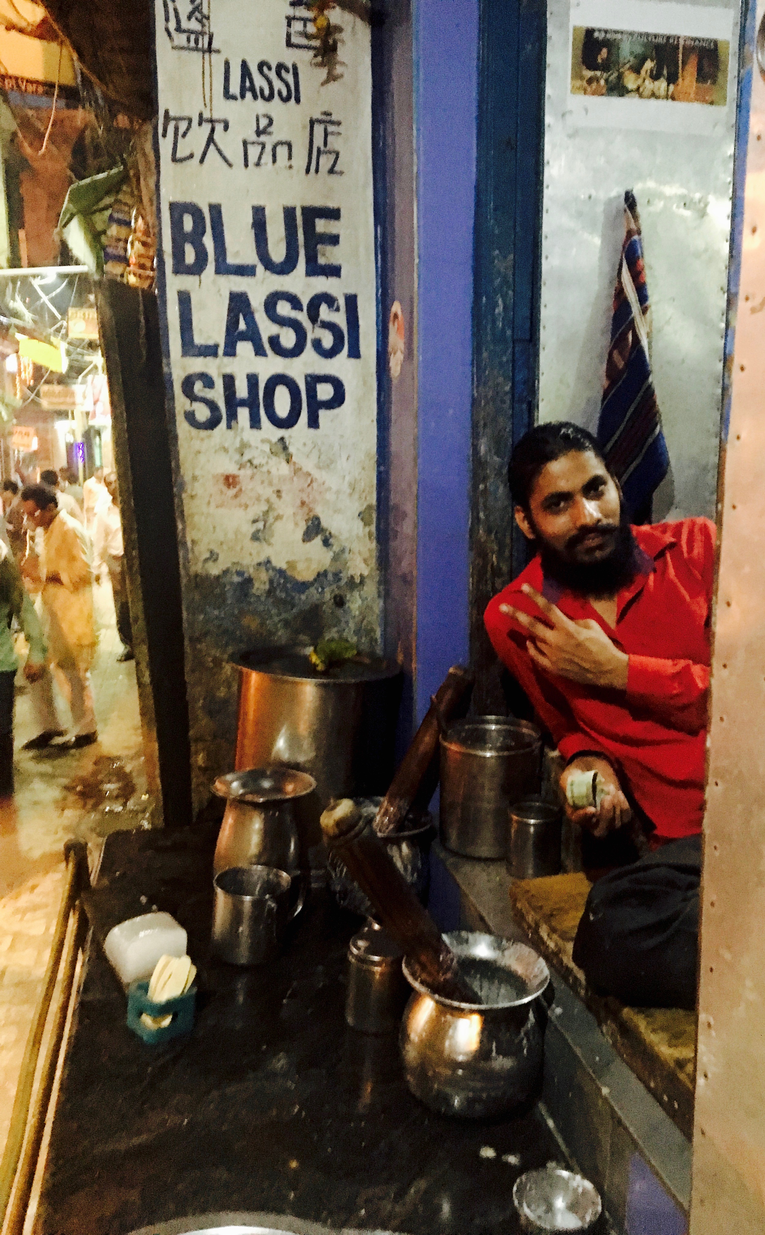 The lassi chef in the flesh and his simple lassi setup.