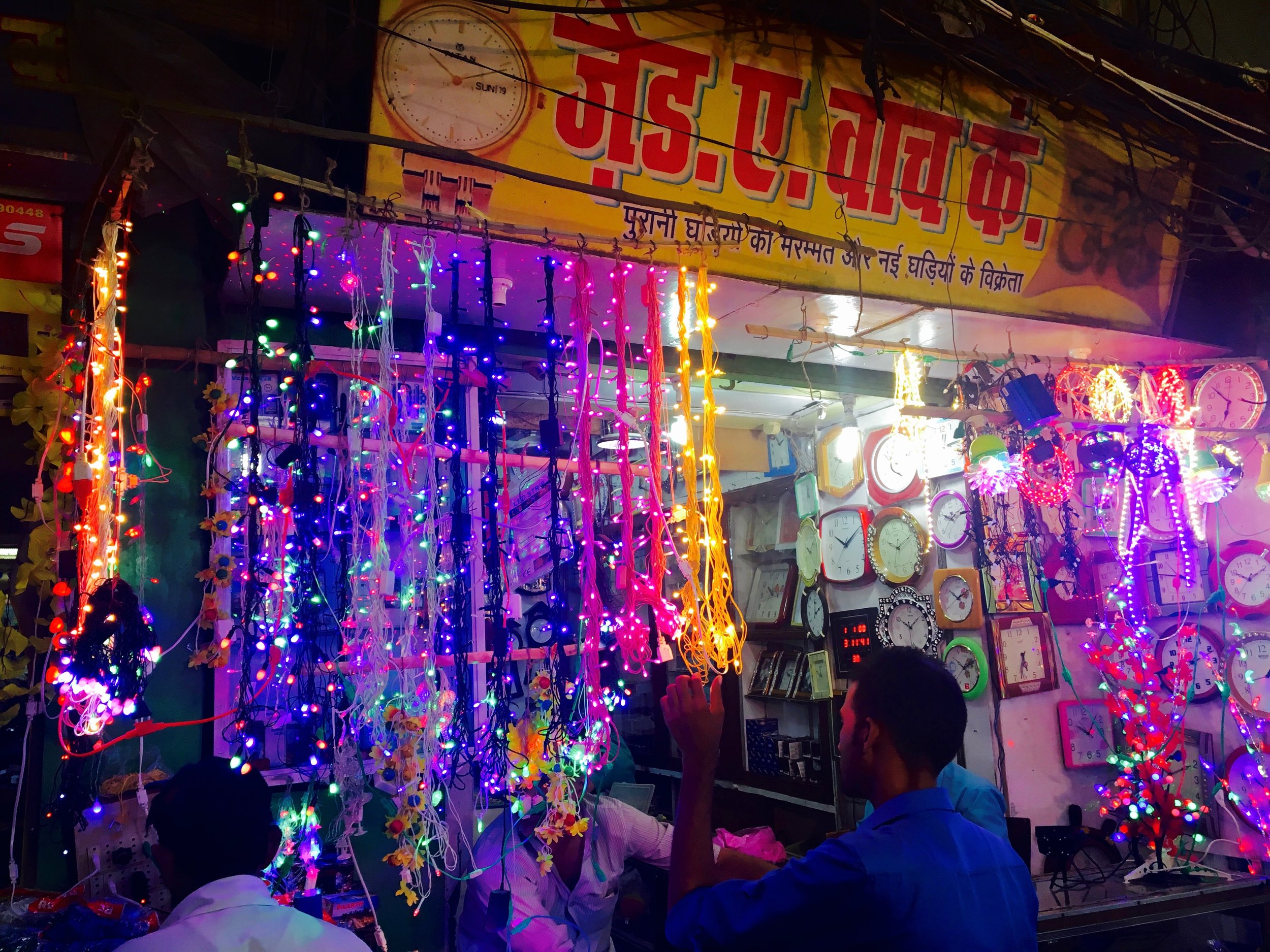 Diwali lights for sale and show everywhere you turn -- kinda reminds me of that amazing Indian restaurant in the East Village on 6th street (is that the idea behind those lights??)
