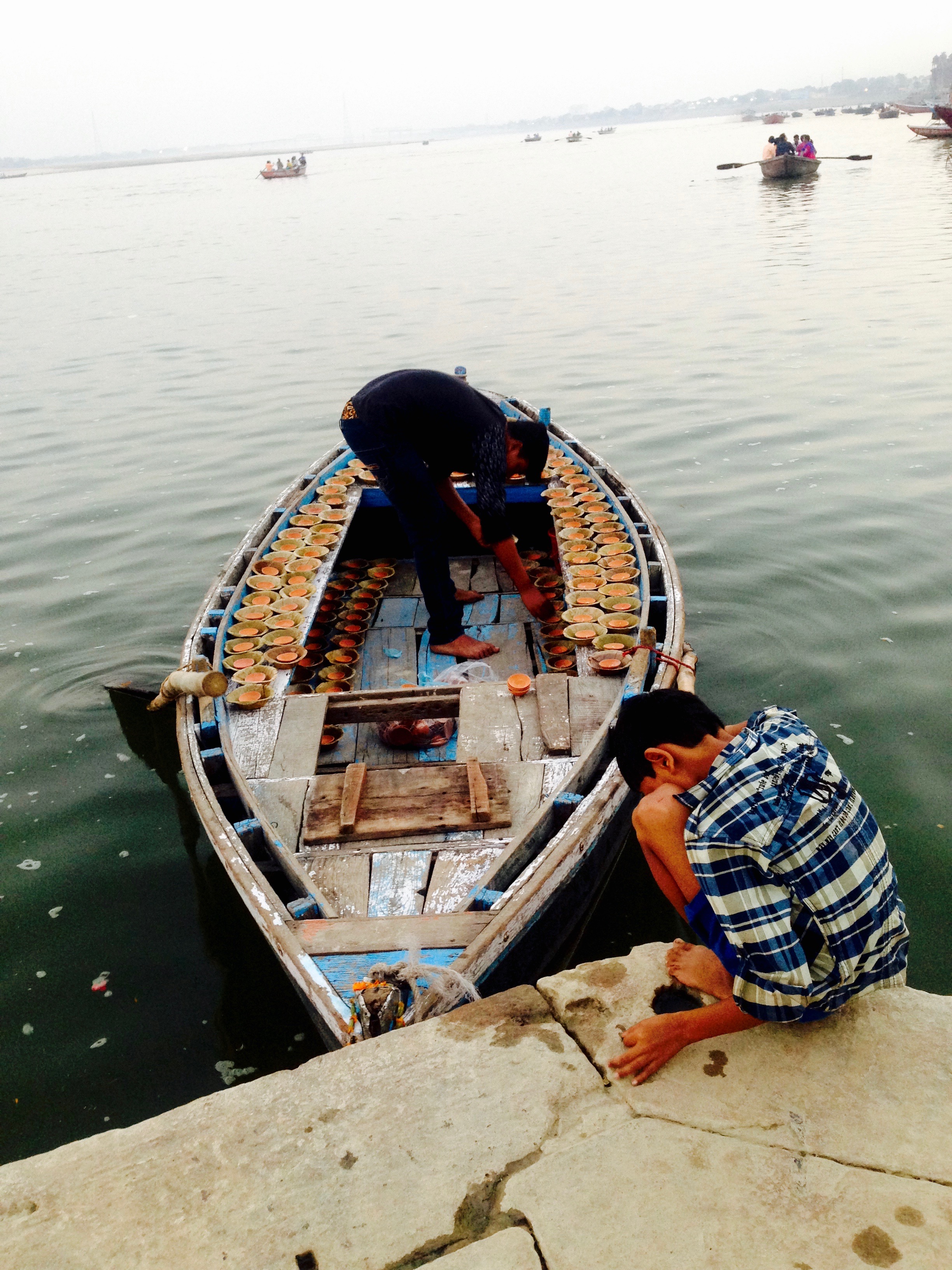 Locals preparing their Diwali candles in handmade ceramic bowls