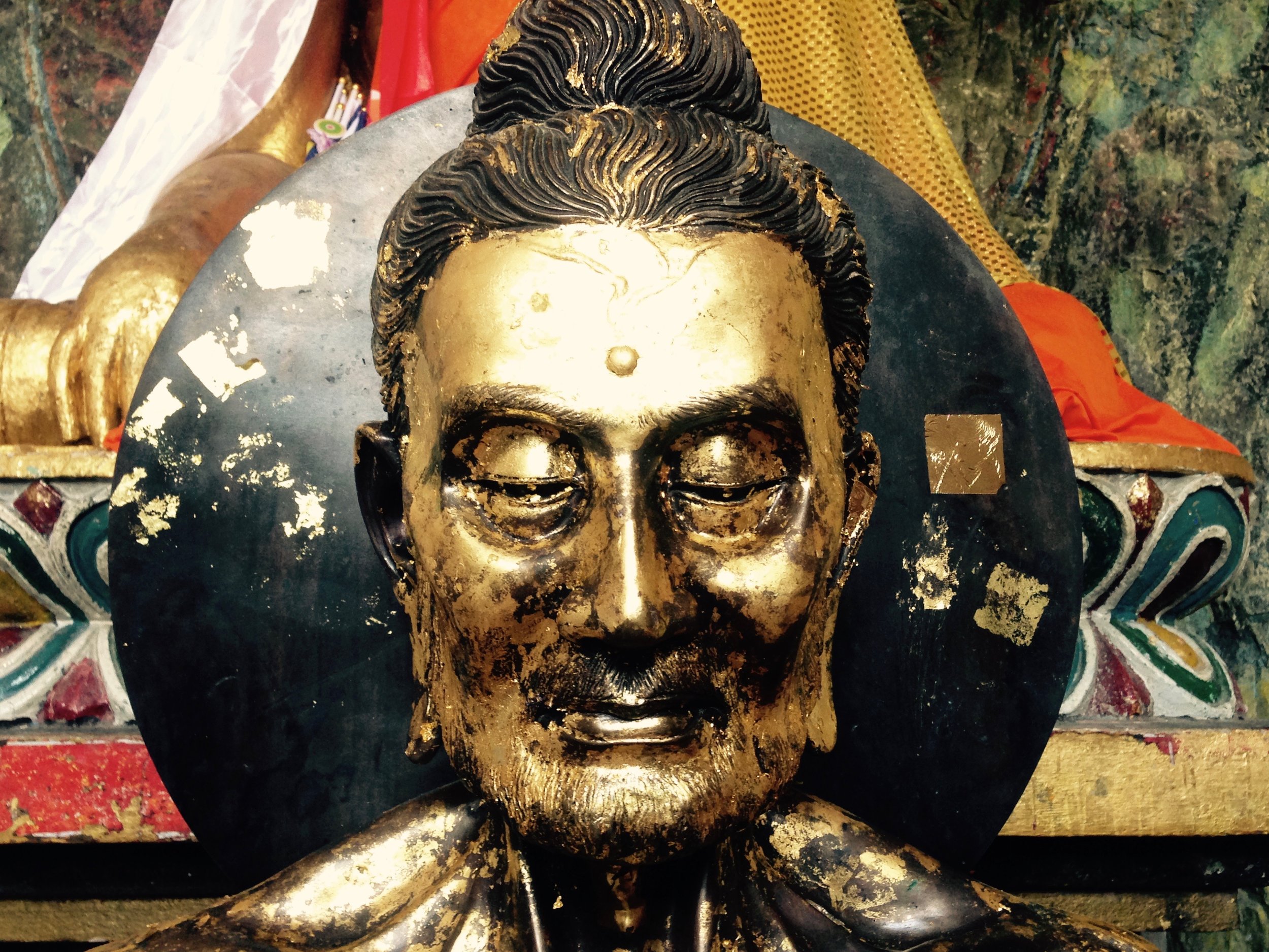 Buddha's emaciated face after 6 years of austere mediation in a dark cave