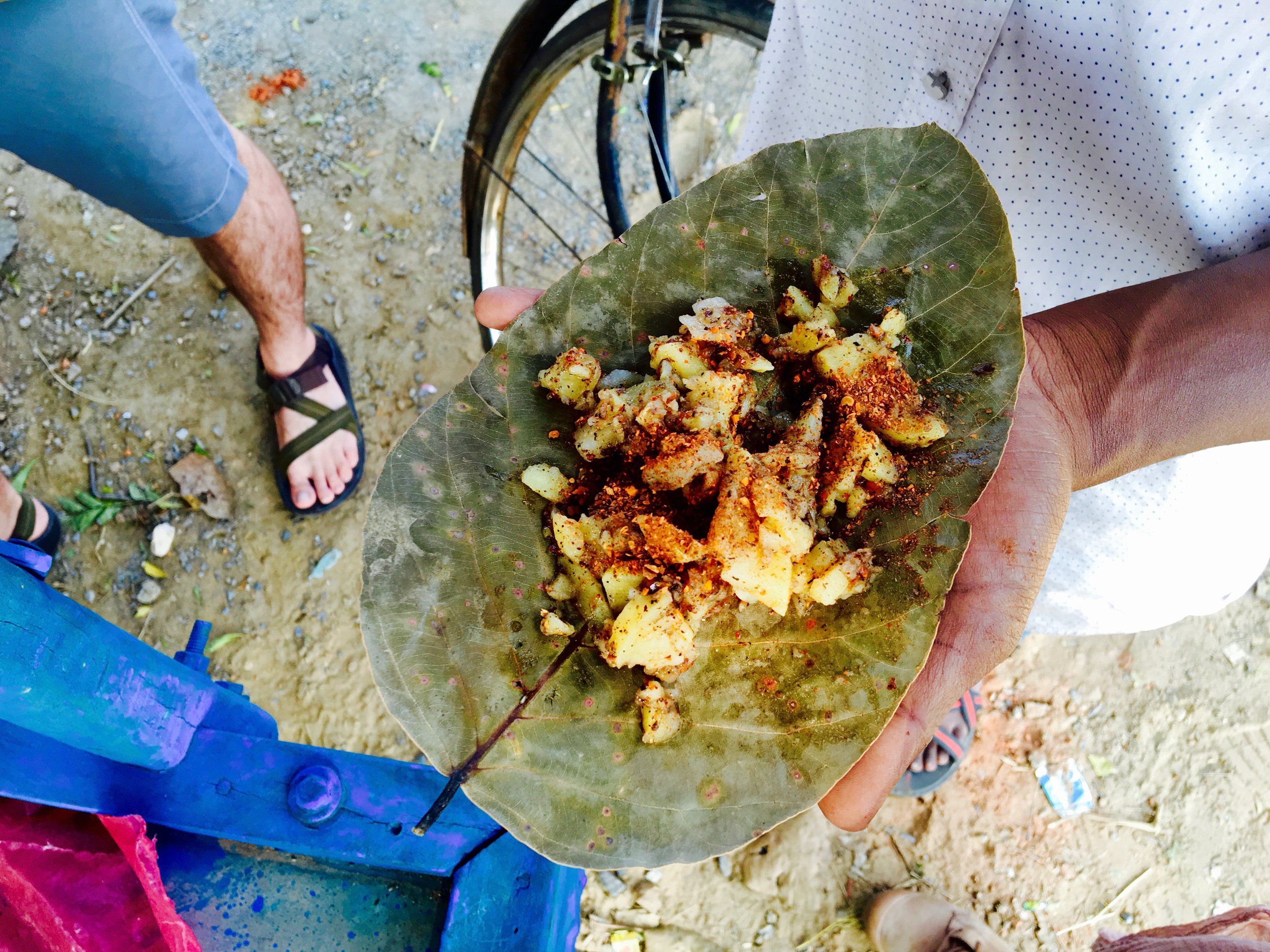 Not about to put this spicy aloo in my mouth (even though you can't get much better than 10 rupees...). Indian stomachs are superior in these scenarios.