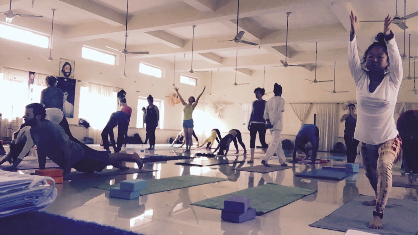 Mid-Surya Namaskar...there are three different sun salutations in Ashtanga, and one morning, we all had to do 108 of these sequences. Yes, you heard right...one hundred eight!