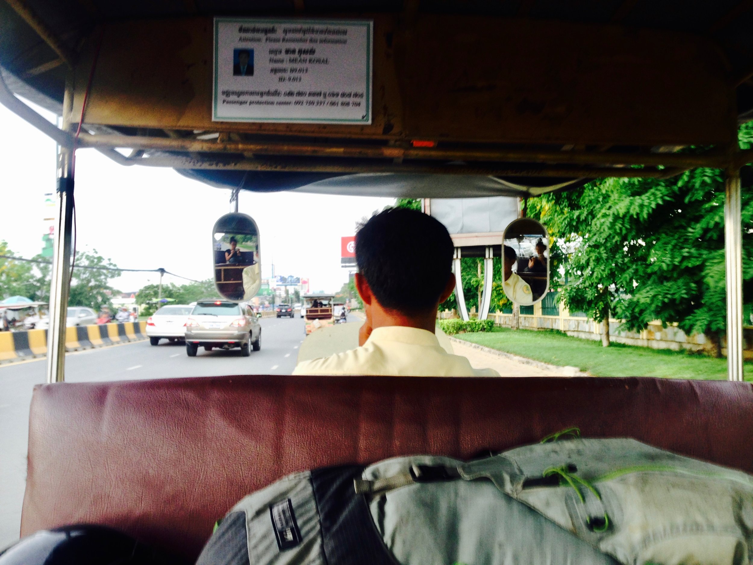 Tuk tucks here have proper curtains on the side (can't see them in this photo) because Cambodian motorbikers are notorious for snatching bags in motion.