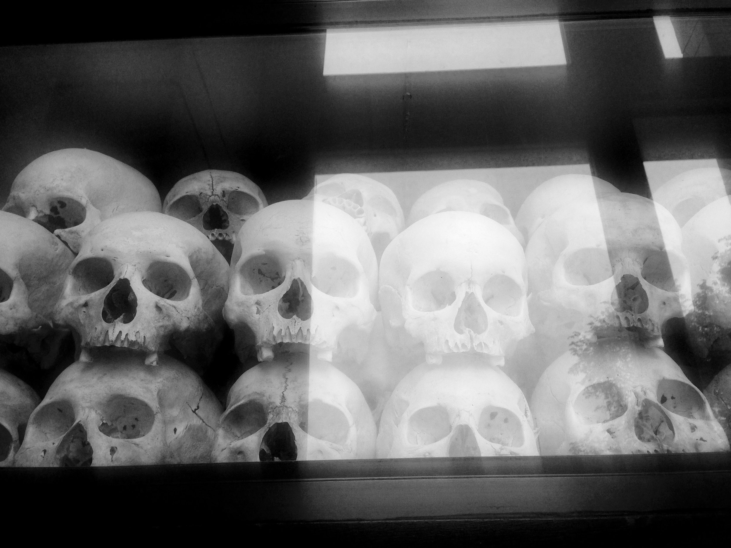 Skull remains that have been preserved at Cambodia's largest Killing Fields. They have been categorized by gender, age, and method of murder. Imagine looking up to eleven stories of skulls, bones and preserved weapons, painting a picture of what unimaginable horror looked like nearly 40 years ago.