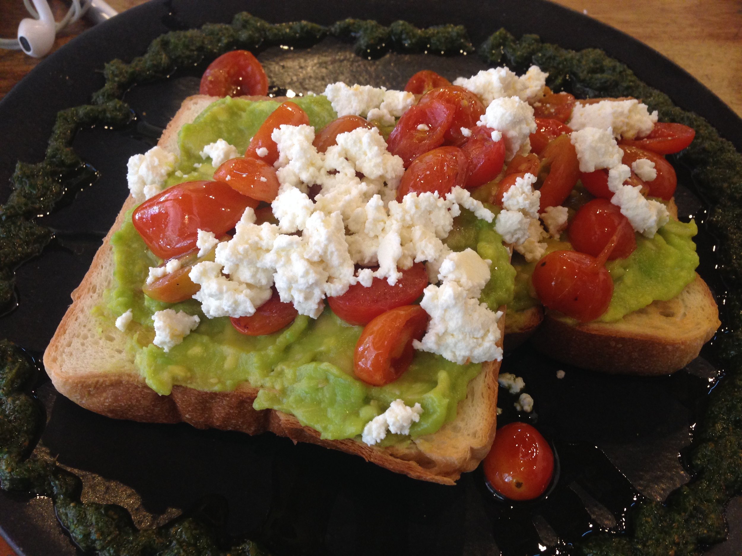 And my all time favorite TAVOCADO! Avocado and tomato smash with crumbled feta on the fluffiest of toast, drizzled with pesto basil cuz whyyyy nottttttt!