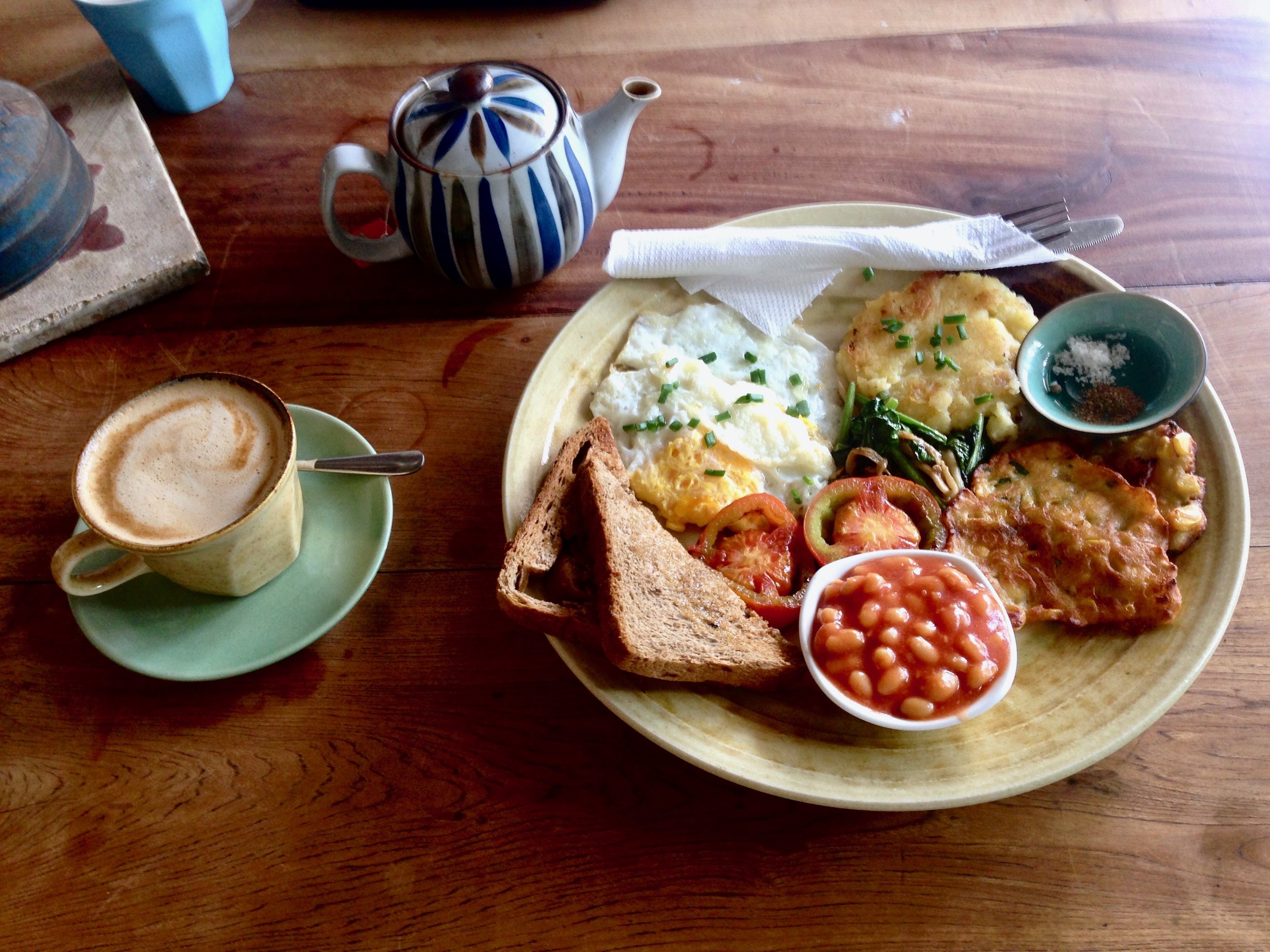 BEST breakfast in ALL of Cambodia (at Ellie's) - corn fritter pattie, beans, roasted tomatoes, sautéed spinach and mushrooms, fried eggs, potato hash browns, toast and locally harvested salt and pepper. Can I get a what whaaaaaaaat?