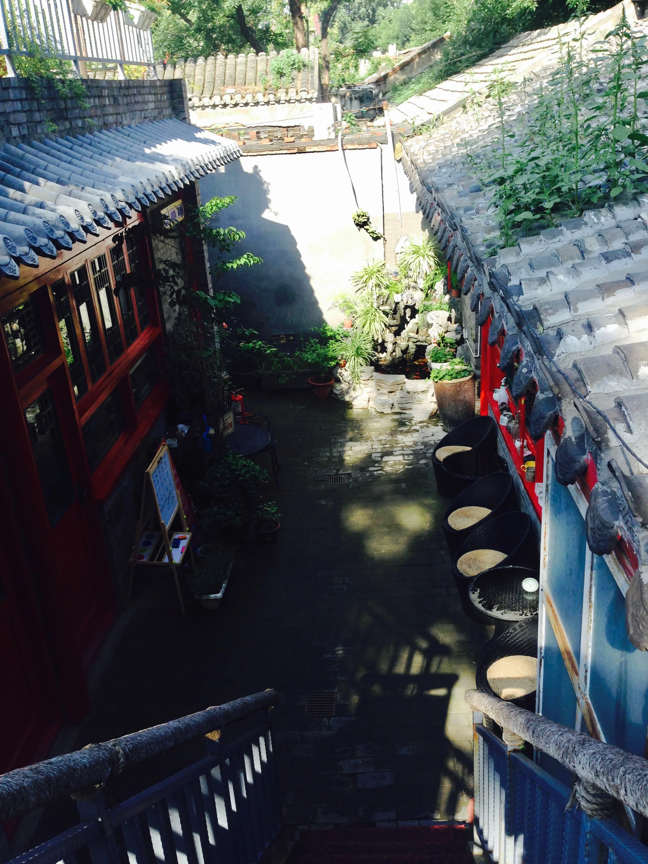 Little slice of peace can be found no farther than in Beijing's best kept secret alleyways, also known as hutongs. There are about 1000 of these left in the city. This was taken in our little boutique hotel, Lama Hotel, whose OG architecture clearly wants to preserve tradition.