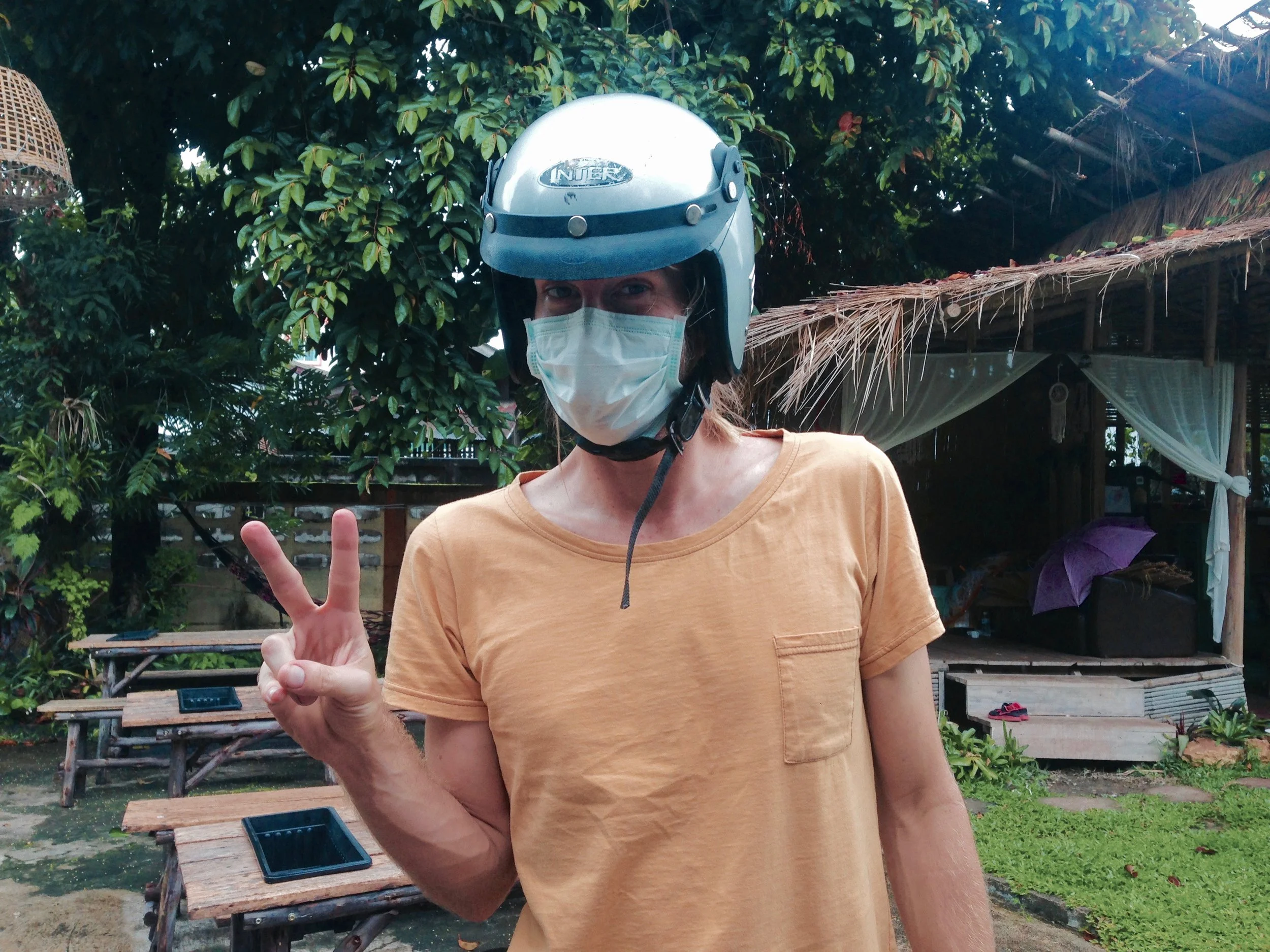 Lesson for us all: when motorbiking on a highway from Chiang Rai to Myanmar, and back, always ALWAYS wear protection. And throw up them peace signs for added coolness.