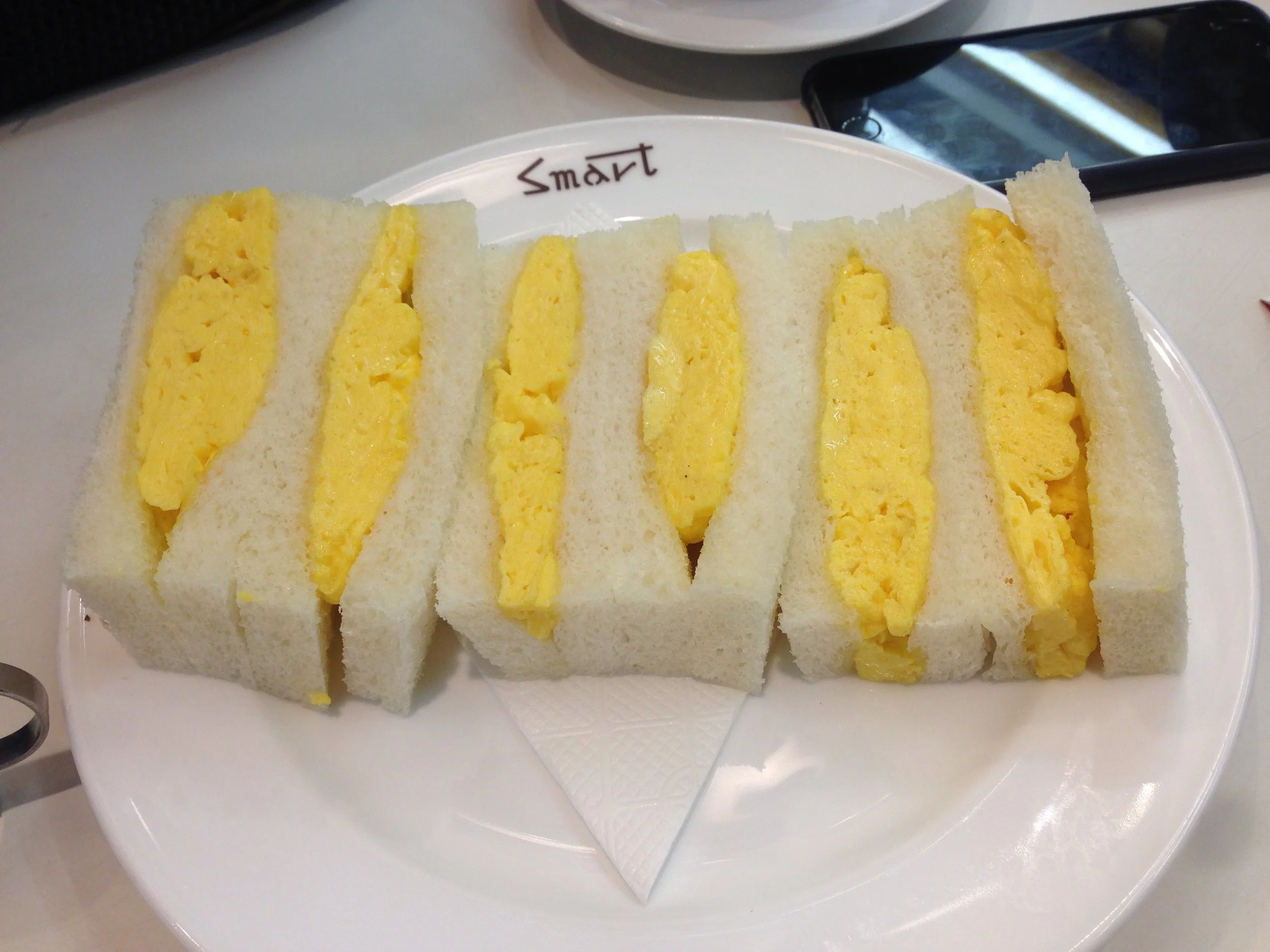 Or such perfectly cut crust surrounding the fluffiest of egg omelettes? 