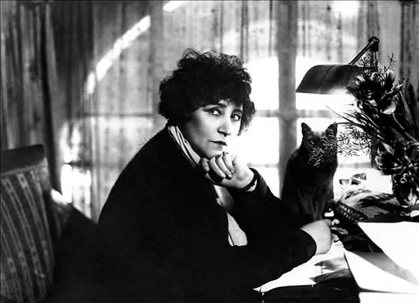 The writer, Colette at her desk