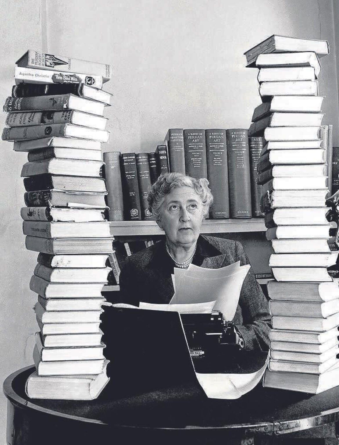 Agatha Christie and her pile of books old lady.jpg