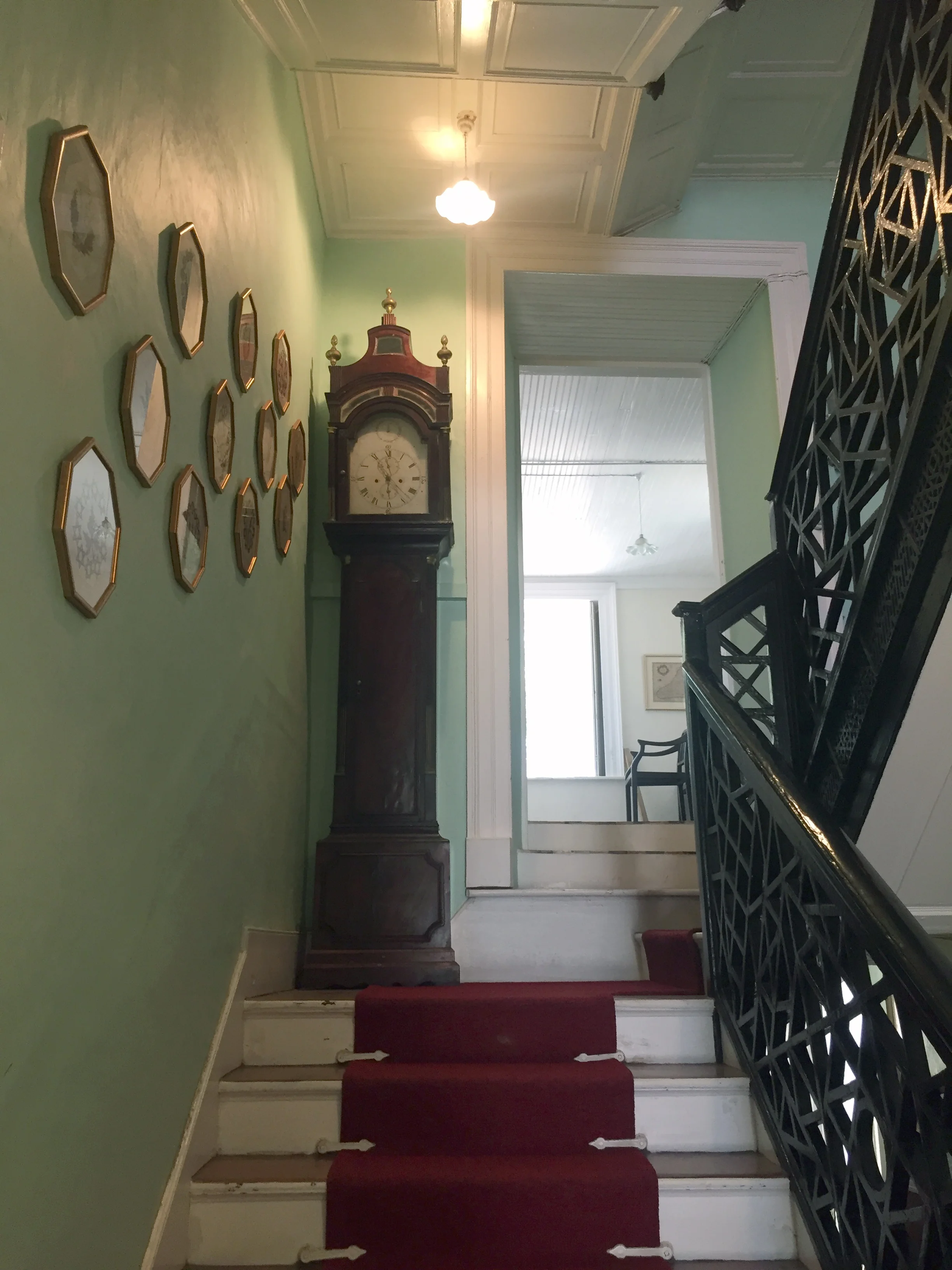 1746 Chippendale staircase has a different pattern on each floor.