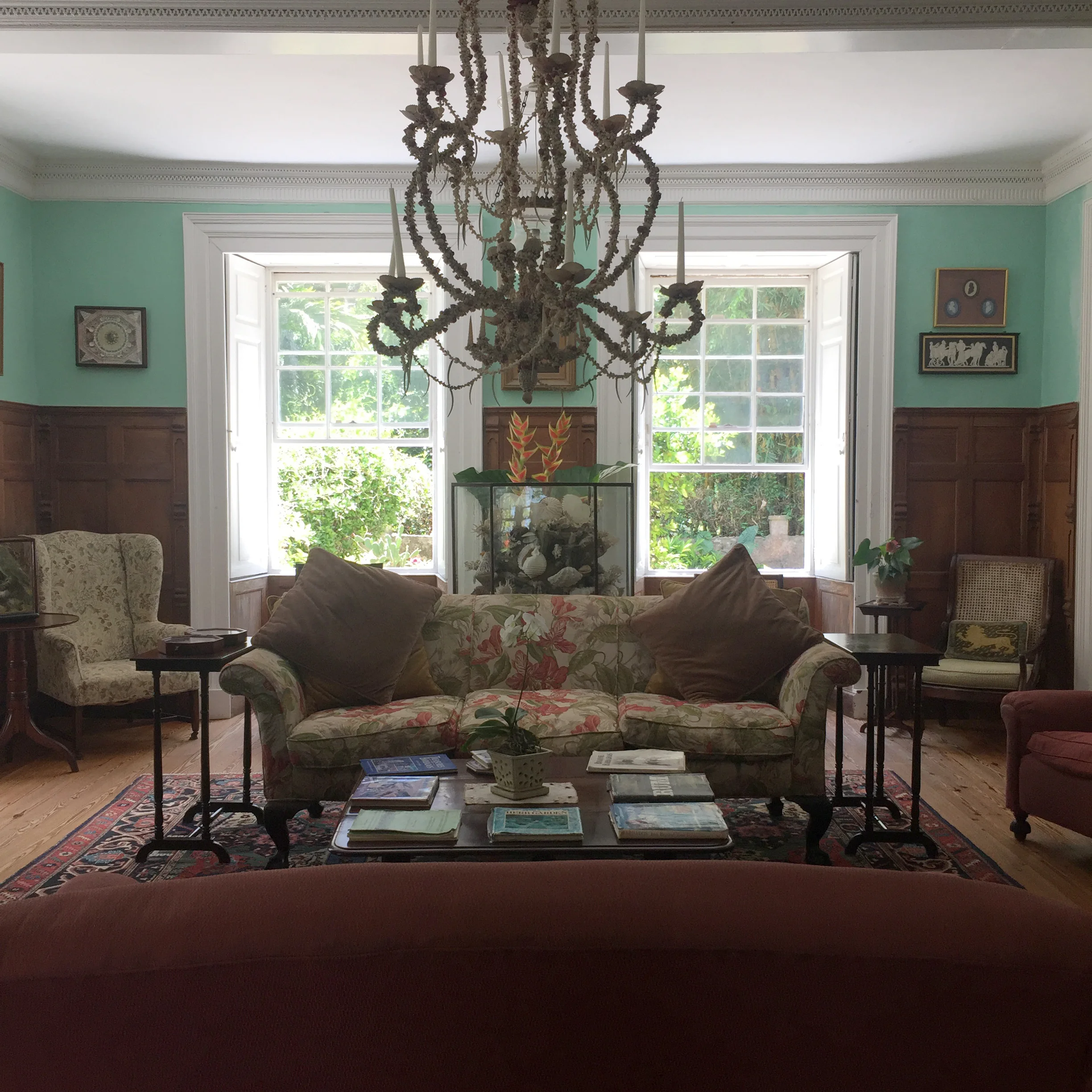Tiffany blue drawing room with seashell chandelier.