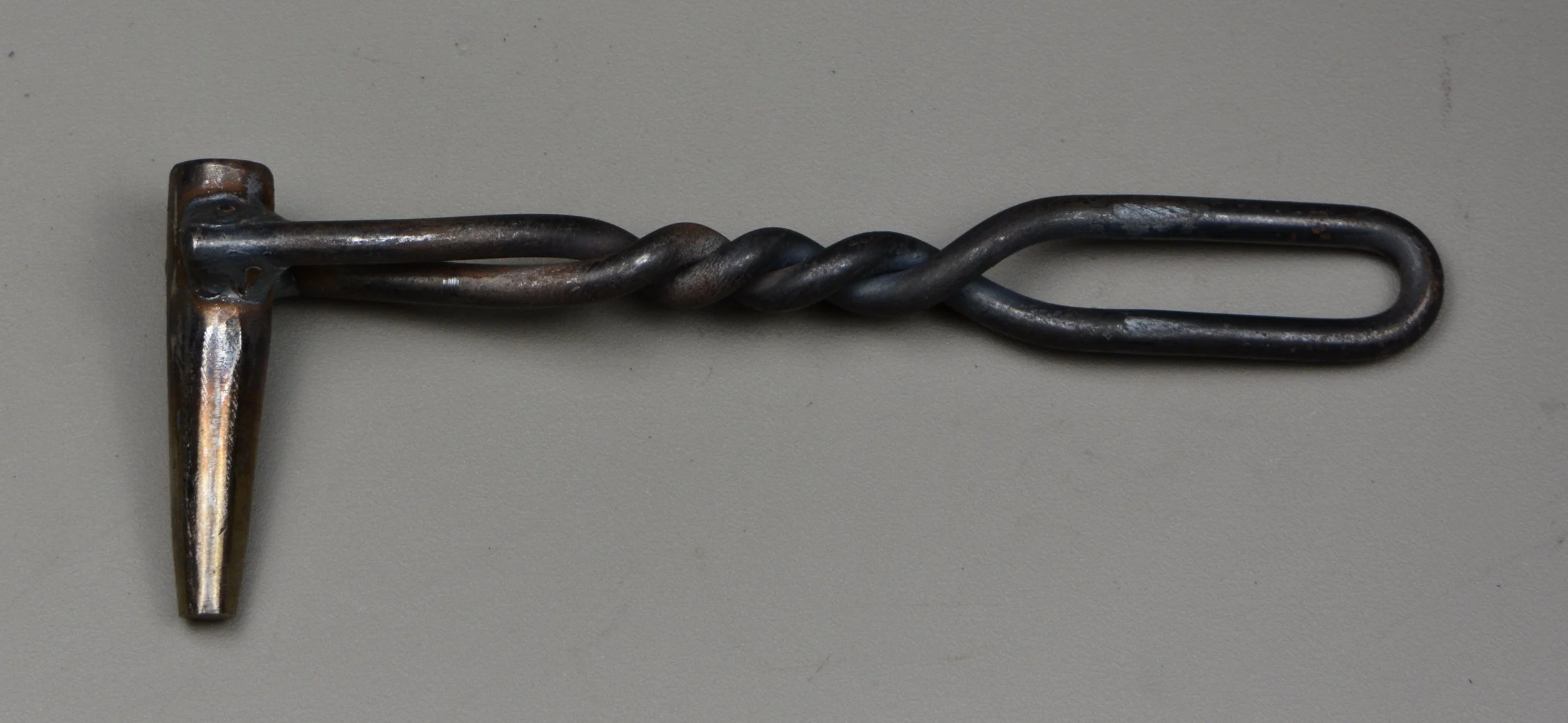 round three eights punc num1, side view.JPG