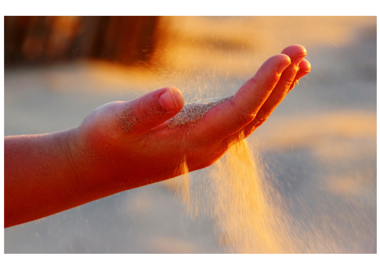 handwithsand.png