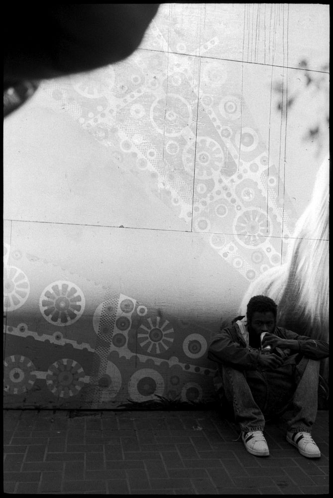 #0435_29A - Drinking Man, Mid-Market Street. San Francisco, CA. March 2016. Leica M2, Zeiss 35mm f/2, Ilford HP5 400.