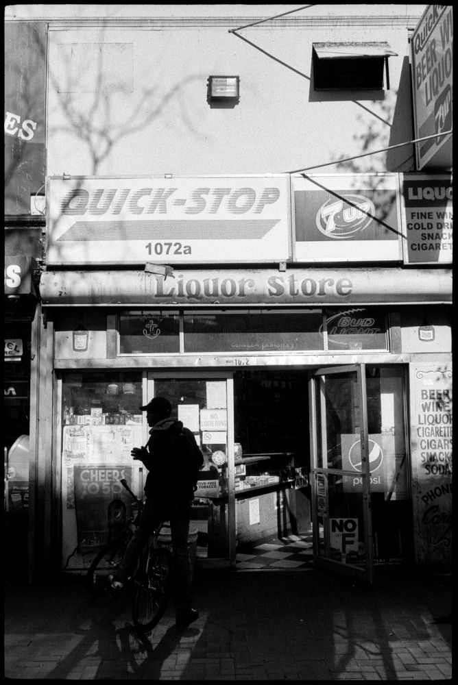 #0435_28A - Liquor Store, Mid-Market Street. San Francisco, CA. March of 2016. Leica M2, Zeiss 35mm f/2, Ilford HP5 400.