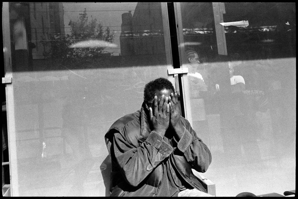 #0443_09A - Bus Shelter, Mission St. San Francisco, CA. March 2016. Leica M2, Zeiss 35mm f/2, Ilford HP5 400.