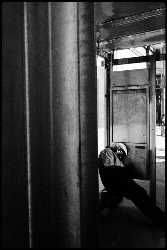 #0435_13A - Bus Shelter, MIssion St. San Francisco, CA. March 2016. Leica M2, Zeiss 35mm f/2, Ilford HP5 400.