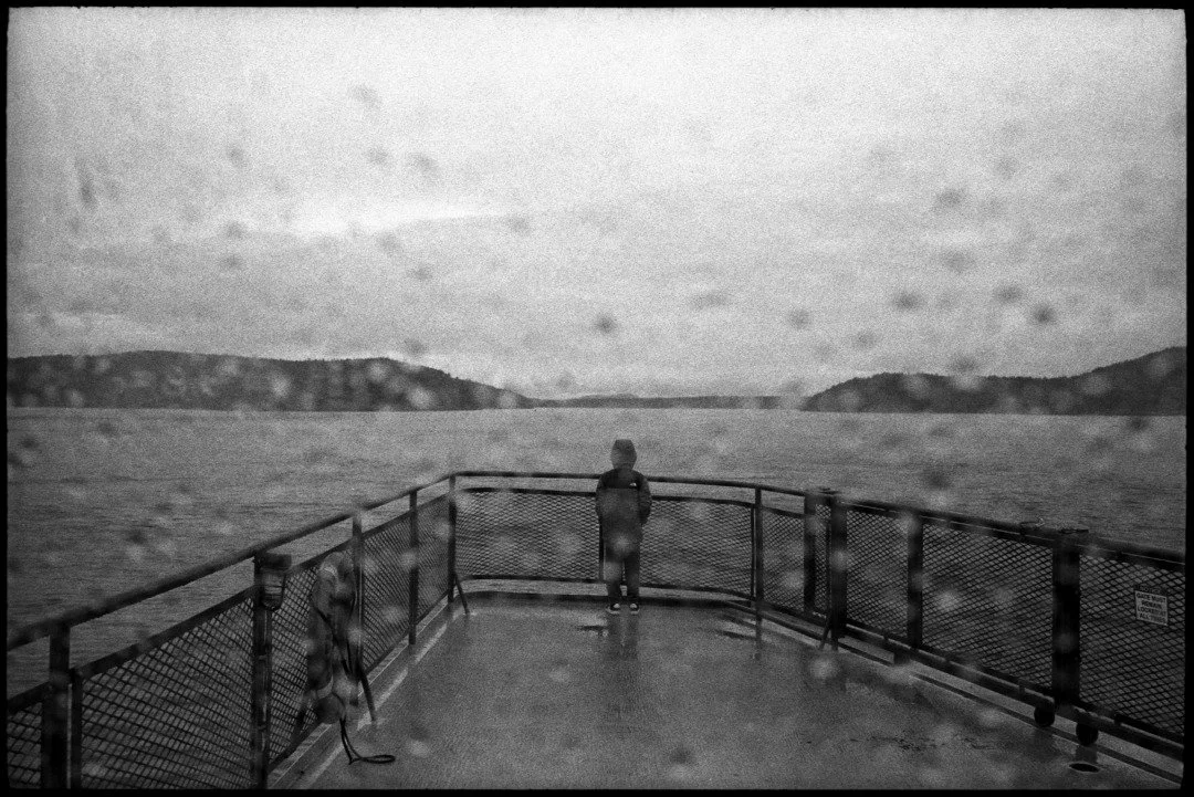 a black and white photograph of the orcas island ferry in the san juan islands in washington stat