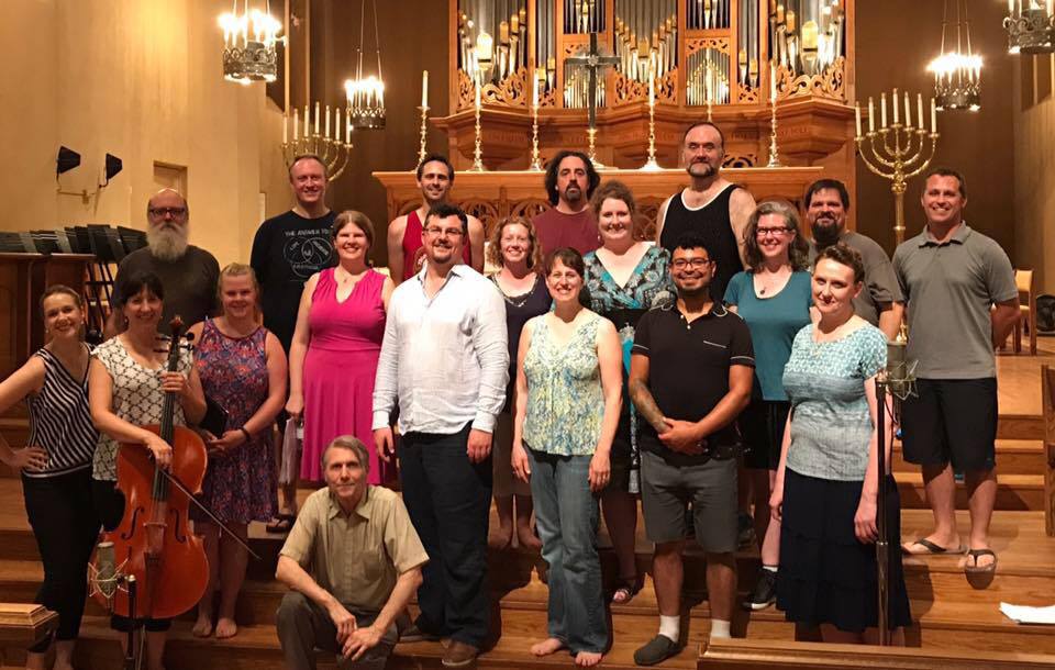 Resonance Ensemble and other Portland area musicians surround the composer, Desmond Earley and RE Artistic Director, Katherine FitzGibbon at a recent rehearsal.