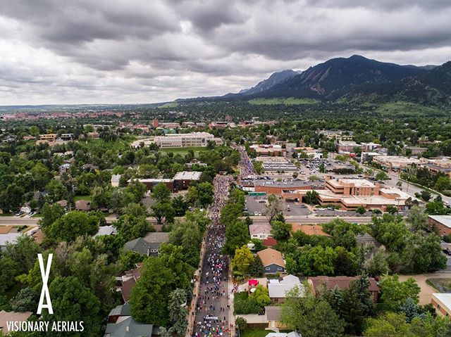 The Bolder Boulder as runners head towards the race finish at Folsom Field on Memorial Day.  #bolderboulder #memorialday #bouldercolorado #colorado #dji #aerialphotography #10k #running