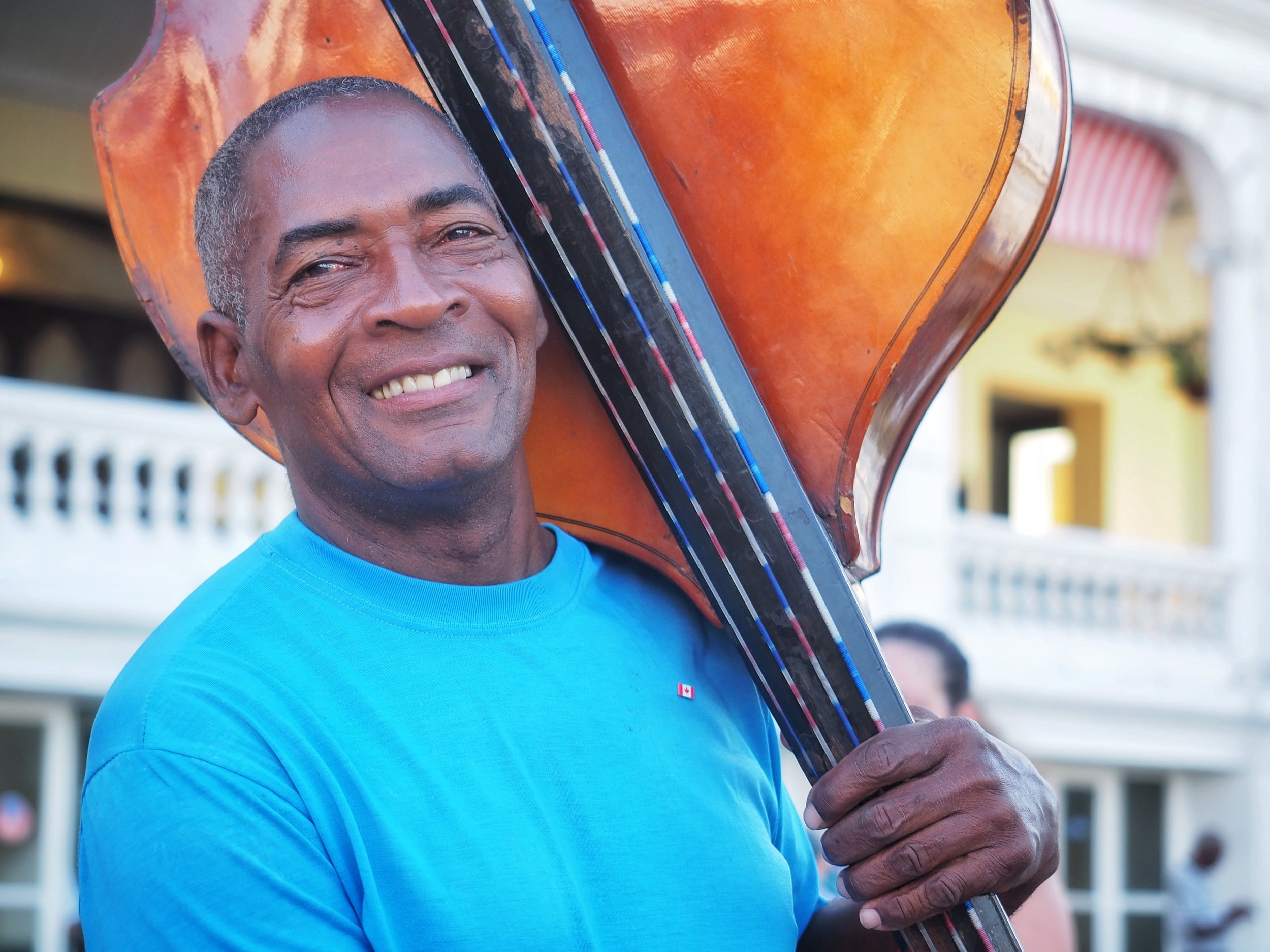 A street musician plays for tips during a shore excursion in Santiago de Cuba