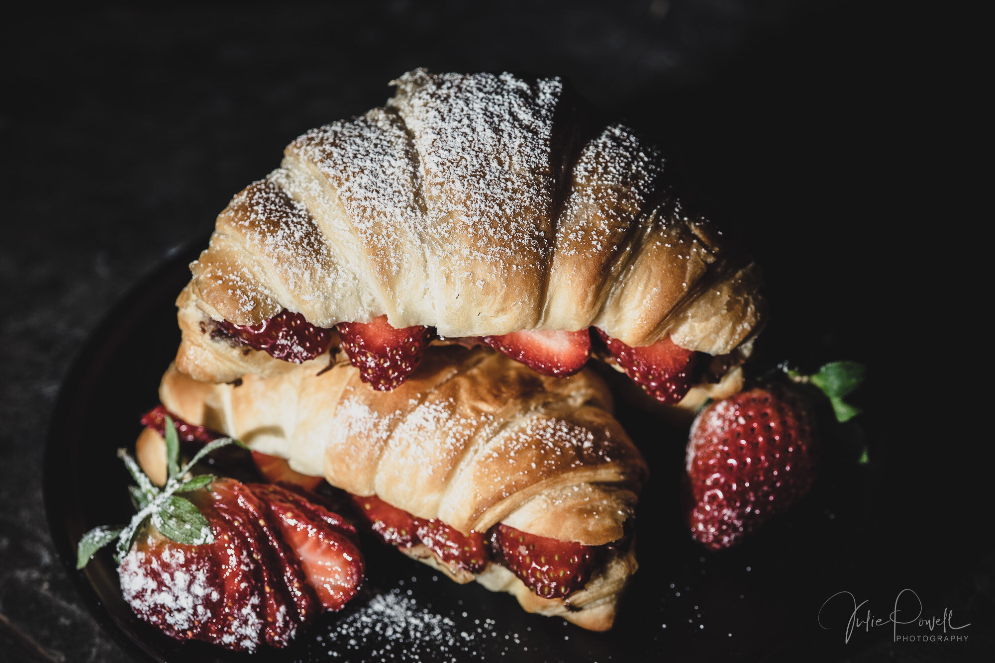 Croissants with Nutella and strawberries