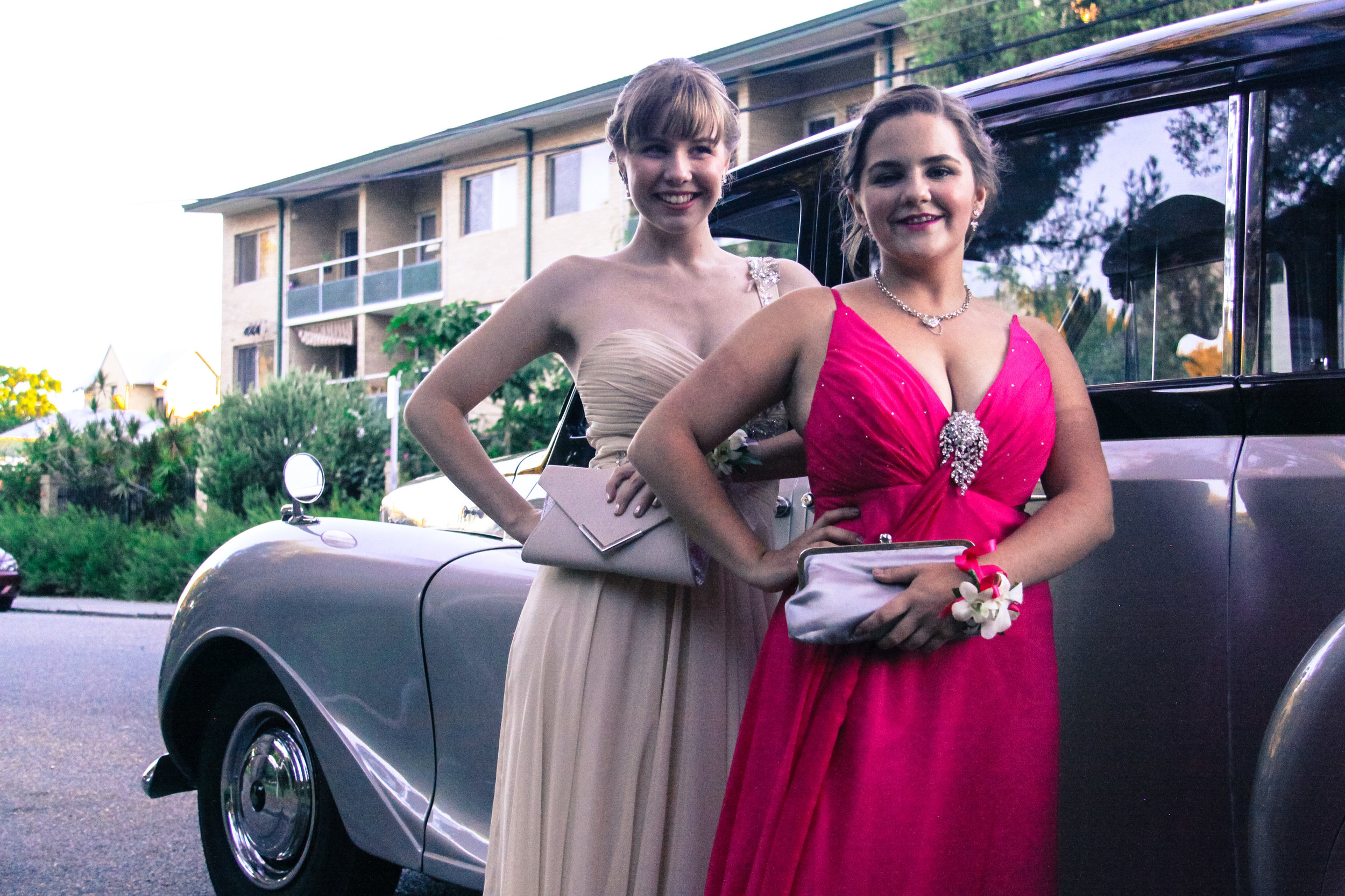 two-girls-with-very-nice-classics-wedding-cars-school-balls-perth.jpg