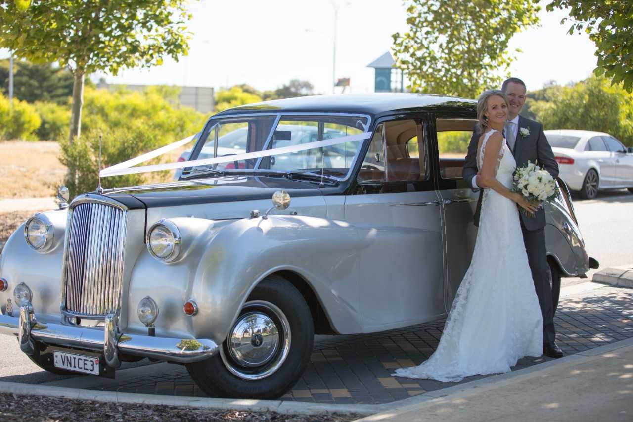 15-Karen_and_Phil_with_Very_Nice_Classics_vintage_wedding_car_Perth_December_2016.jpg