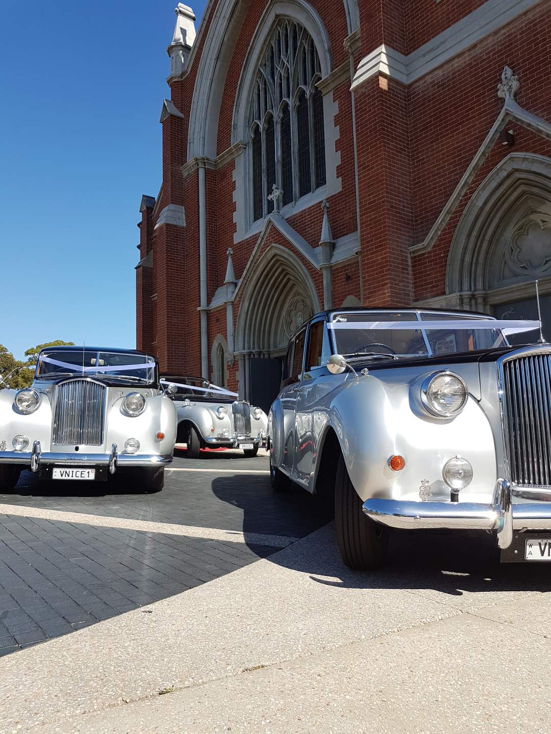 3-very-nice-classics-wedding-cars-in-perth-in-front-of-church.jpeg