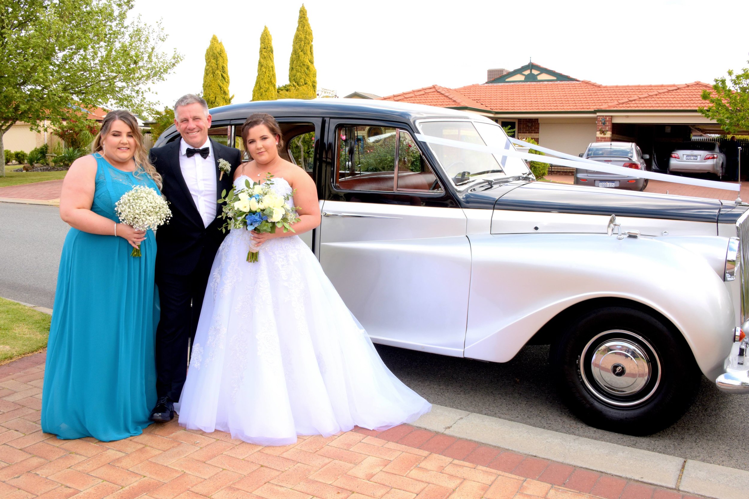 Amber & Aaron Baldivis Bride Bridesmaid and Dad at home.jpeg