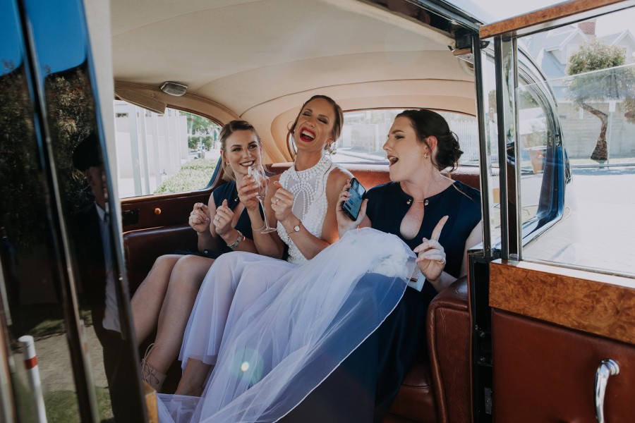 Kasse_John_Modern-Classic-Wedding_Folktales-Photography-girls-in-back-Very-Nice-Classics-wedding-car.jpg